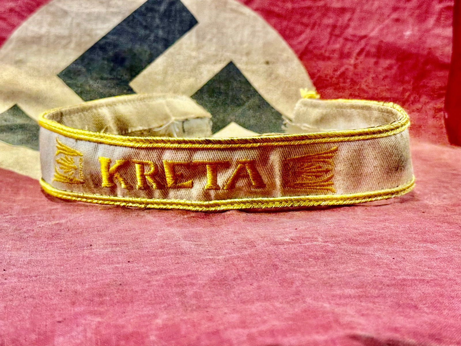 German WWII Unissued Crete Campaign Cuff Title - KRETA: German WWII Unissued Crete Campaign Cuff Title - KRETA. This is an excellent unissued example of a Kreta (Crete) Campaign Cuff title, which shows no signs of ever having been attached to a uniform. It