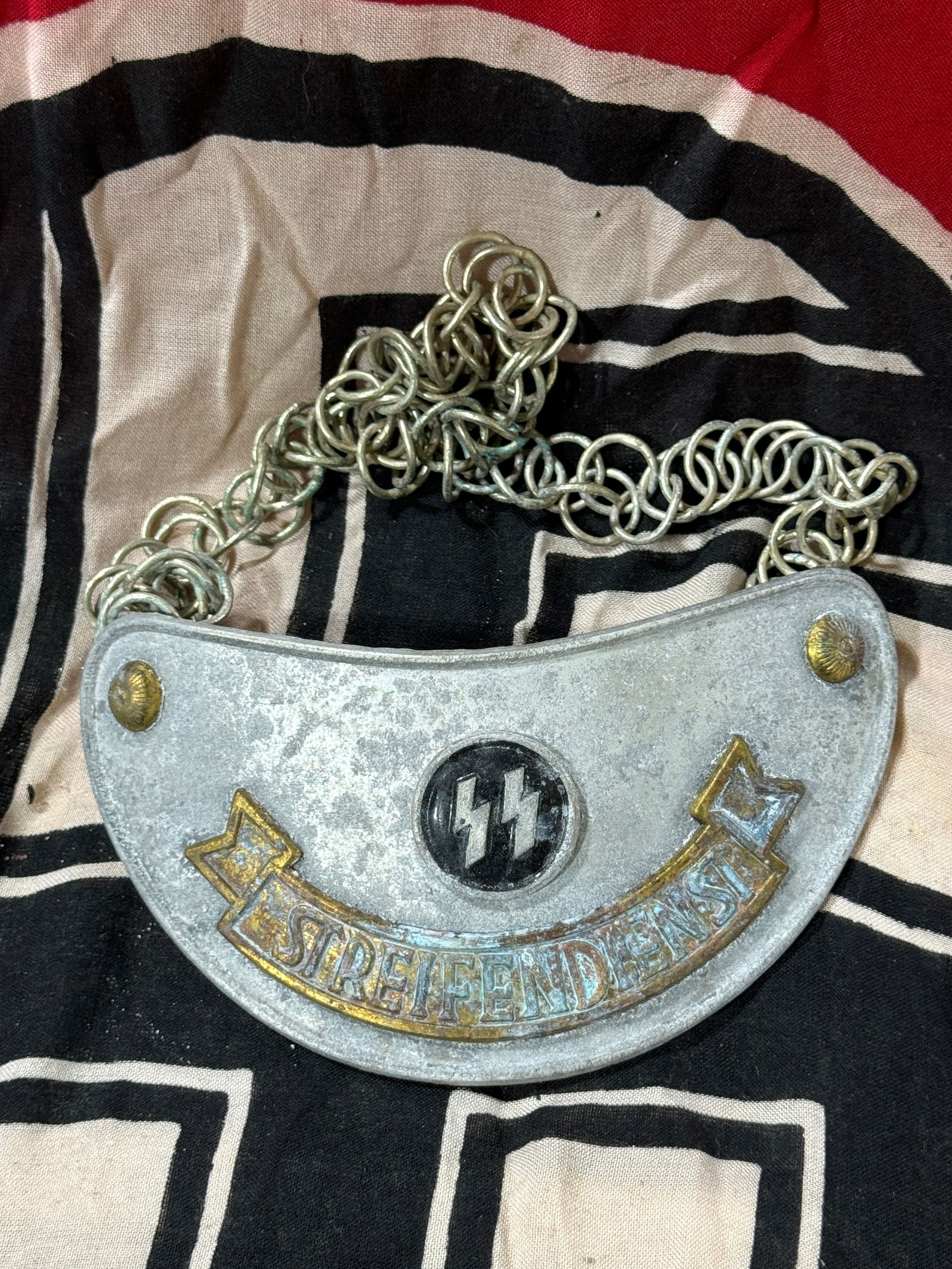 WW2 German SS Streifendienst Gorget: WW2 German SS Streifendienst Gorget. The SS Streifendienst Gorget is one of the most desirable gorgets manufactured during the Third Reich, and remains an extremely sought-after piece of SS regalia. T