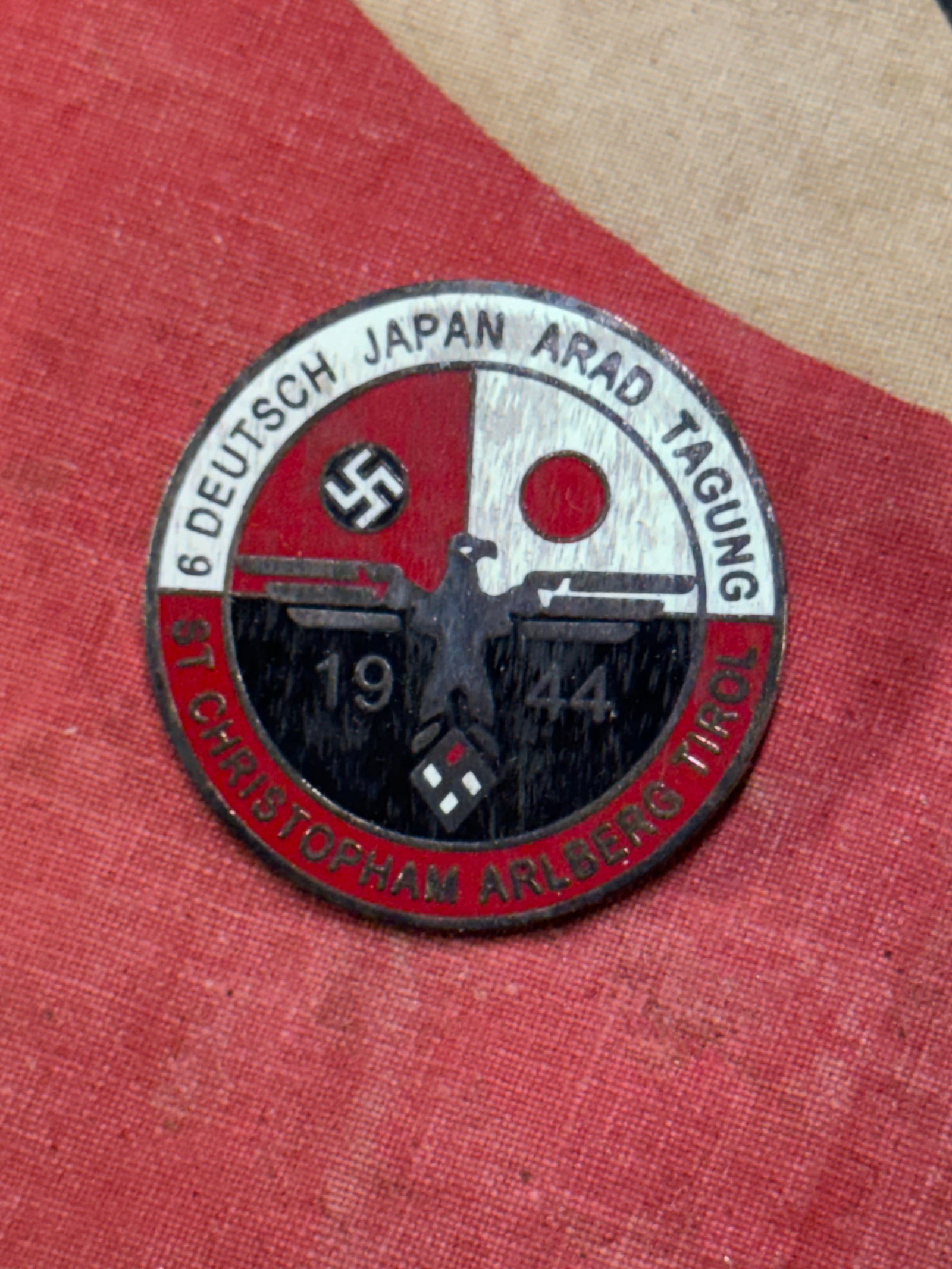 WWII GERMAN JAPANESE HITLER YOUTH UNITY BADGE BY RZM M1/122: WWII GERMAN JAPANESE HITLER YOUTH UNITY BADGE BY RZM M1/122 - MAKER MARKED ON REVERSE. SHOWS GOOD WEAR AND USE WITH A BEAUTIFUL OVERALL PATINA. PLEASE VIEW ALL DETAILED PICTURES. A SCARCE EXAMPLE.