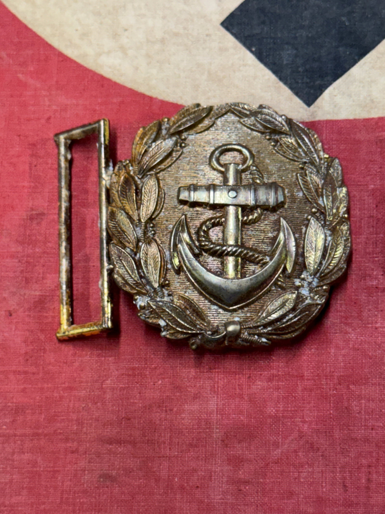WW2 German Kriegsmarine Officer Sword Belt Buckle: WW2 German Kriegsmarine Officer Sword Belt Buckle. A scarce example. Shows good wear and use with a beautiful overall patina. Please view all detailed pictures. A scarce example.