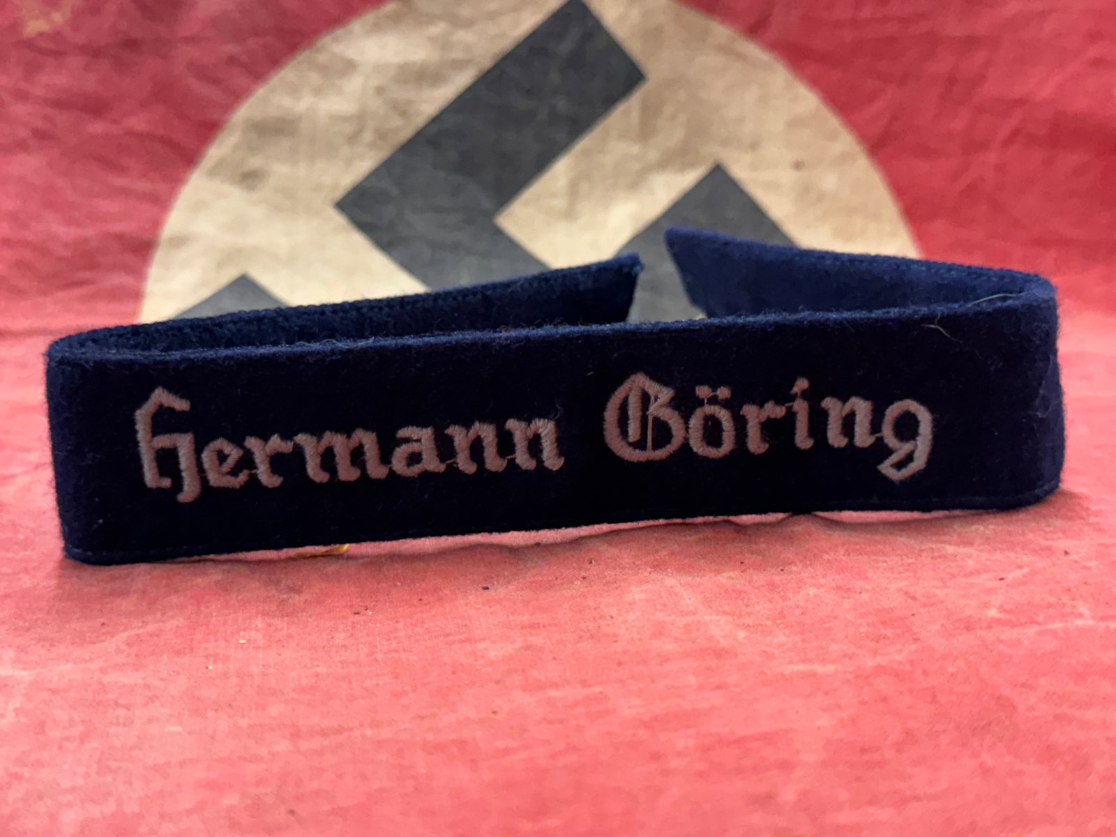 WW2 German Luftwaffe EM/NCO Hermann Göring Division Cufftitle – (Uniform Removed): WW2 German Luftwaffe EM/NCO Hermann Göring Division Cufftitle – (Uniform Removed). Great example of a period worn and later uniform removed Hermann Göring Division cufftitle as worn by Enlisted Me
