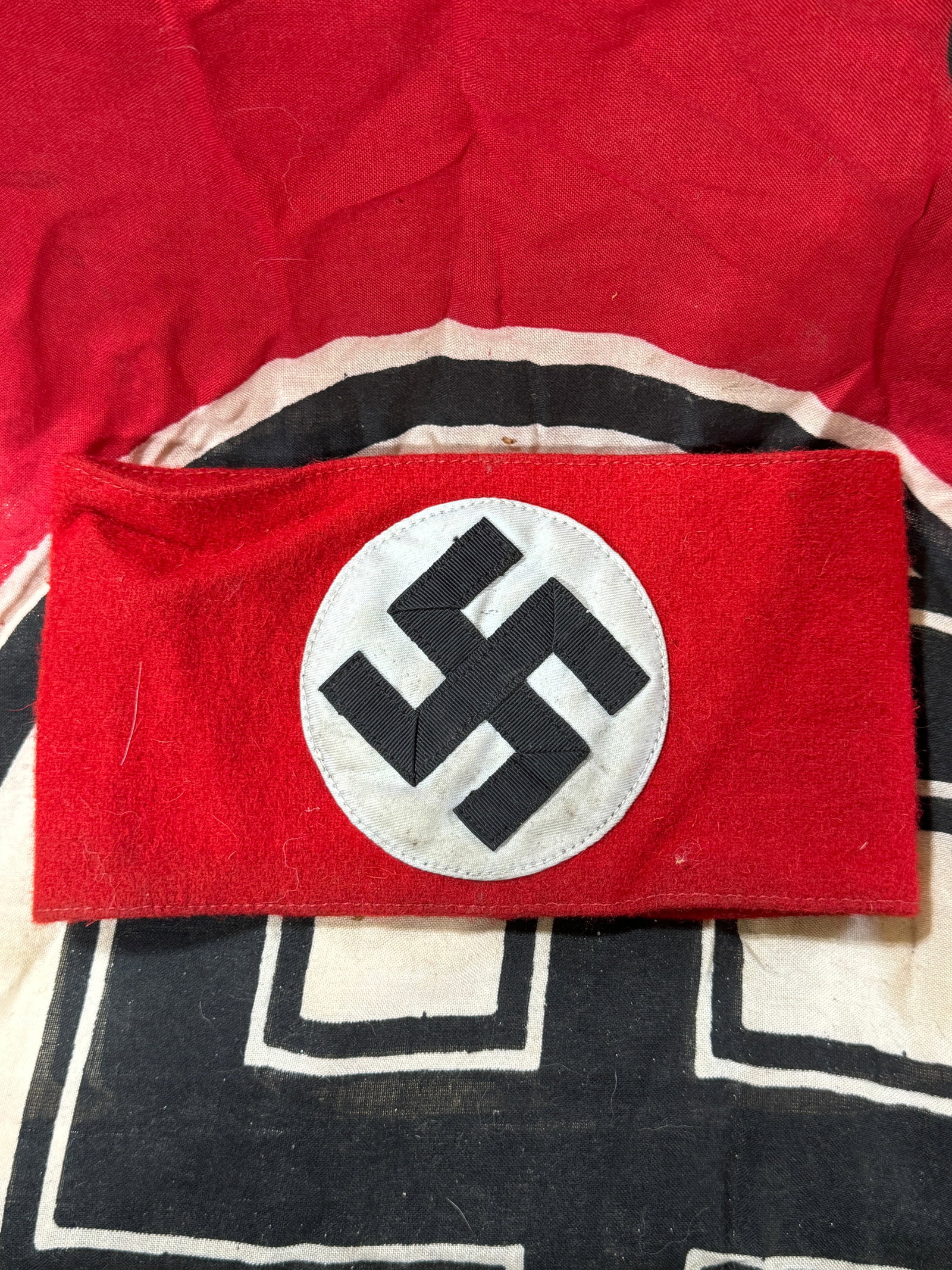 WW2 GERMAN NSDAP ARMBAND - 3 PIECE CONSTRUCTION: WW2 GERMAN NSDAP ARMBAND - 3 PIECE CONSTRUCTION. A VERY RARE EXAMPLE. THAT IS IN MINT OVERALL SHAPE AND CONDITION WITH A BEAUTIFUL OVERALL PATINA. A RARE EXAMPLE.