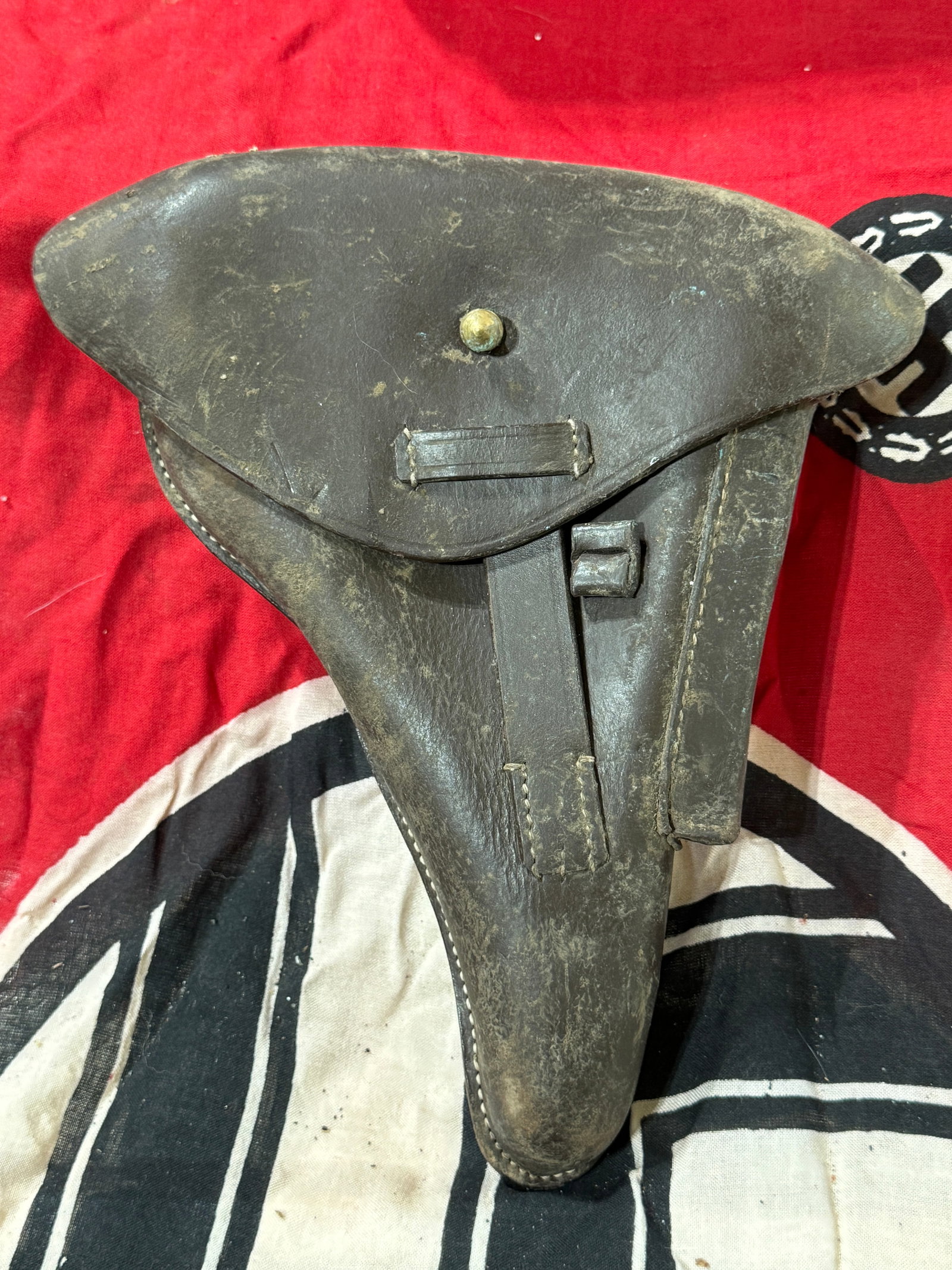 German WWII Luger Holster 1936 - Maker Marked: German WWII Luger Holster 1936 - Maker Marked. A rare find. Shows good wear and use with a beautiful overall patina. Please view all detailed pictures. A scarce example.