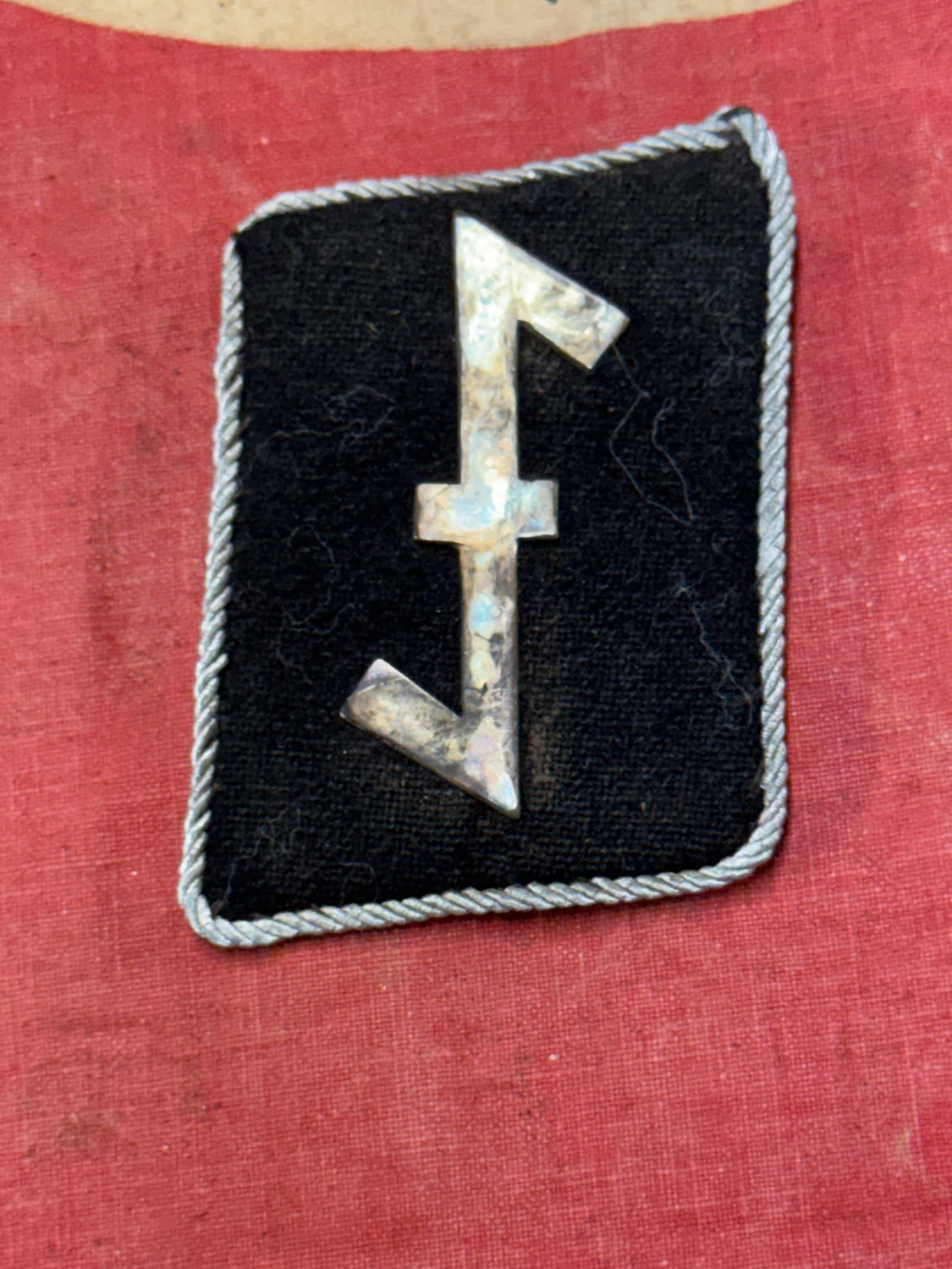 WW2 German Waffen-SS 'Nederland' Division Collar Tab: WW2 German Waffen-SS 'Nederland' Division Collar Tab. A very rare example. Shows good wear and use with a beautiful overall patina. Please view all detailed pictures. A scarce example.