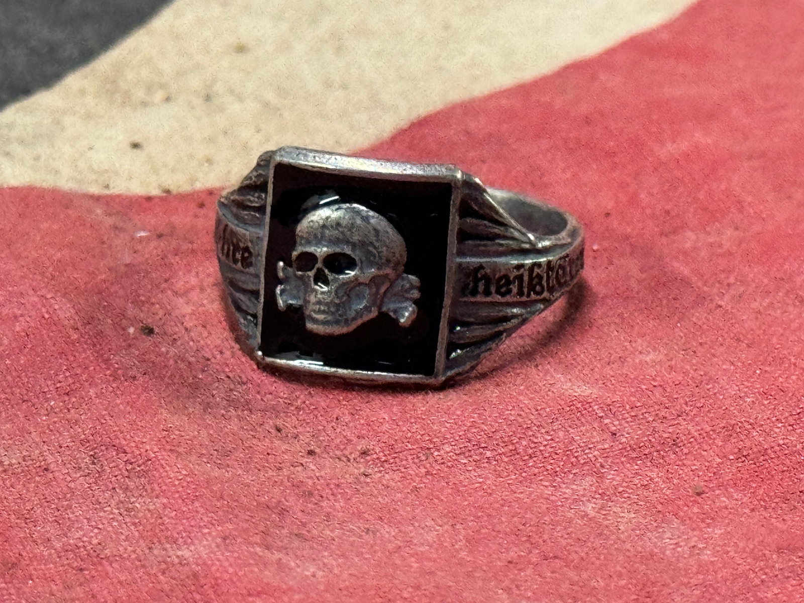 WWII GERMAN THIRD REICH SS MOTTO SILVER RING: WWII GERMAN THIRD REICH SS MOTTO SILVER RING. A VERY RARE FIND. SHOWS GOOD WEAR AND USE WITH A BEAUTIFUL OVERALL PATINA. PLEASE VIEW ALL DETAILED PICTURES. A VERY SCARCE EXAMPLE.