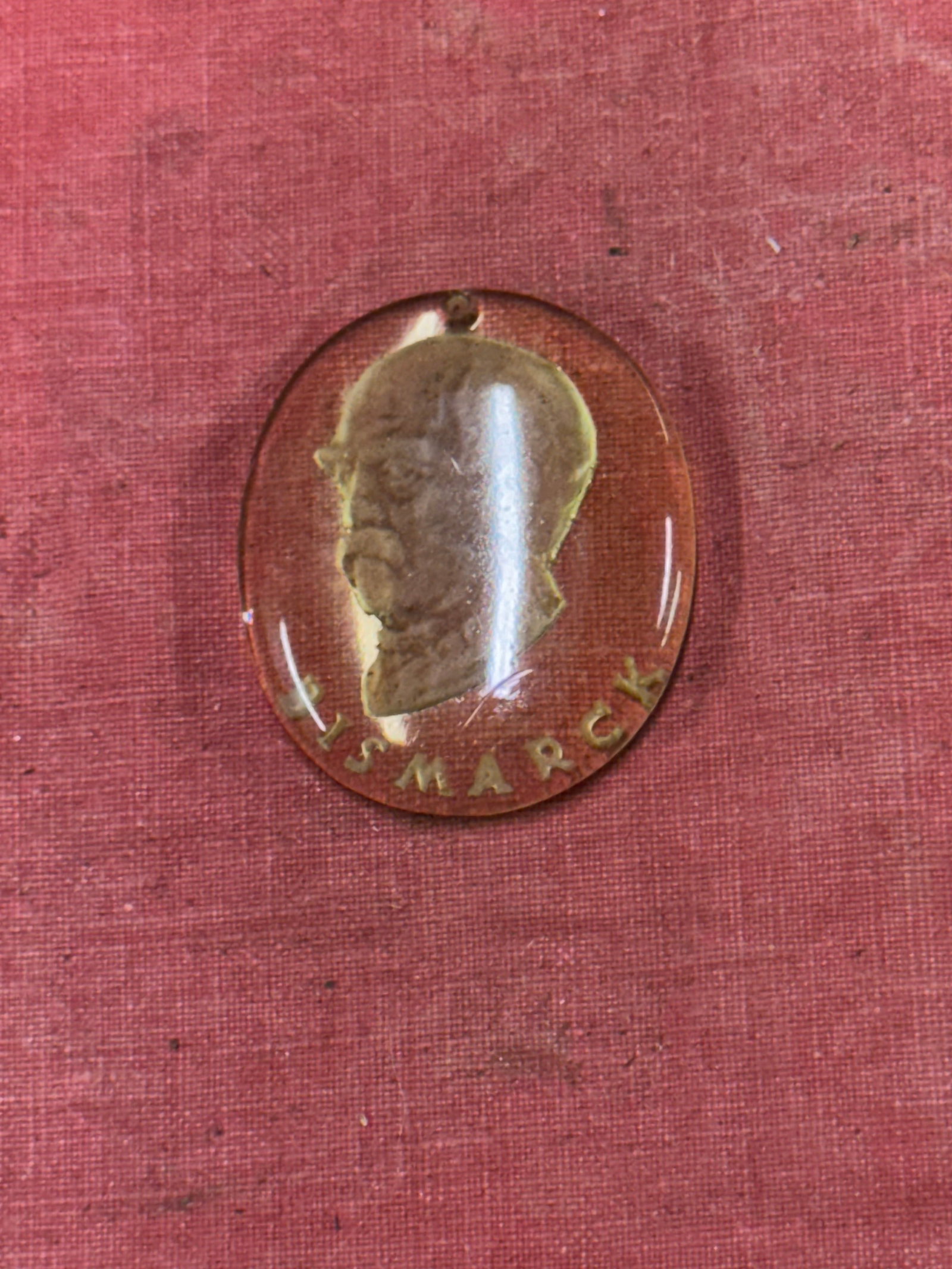 WW2 German WHW Glass Pendant Bismarck: WW2 German WHW Glass Pendant Bismarck. These glass pendant sure are popular! Bismarck is probably the second most popular next to Hitler out of this set.