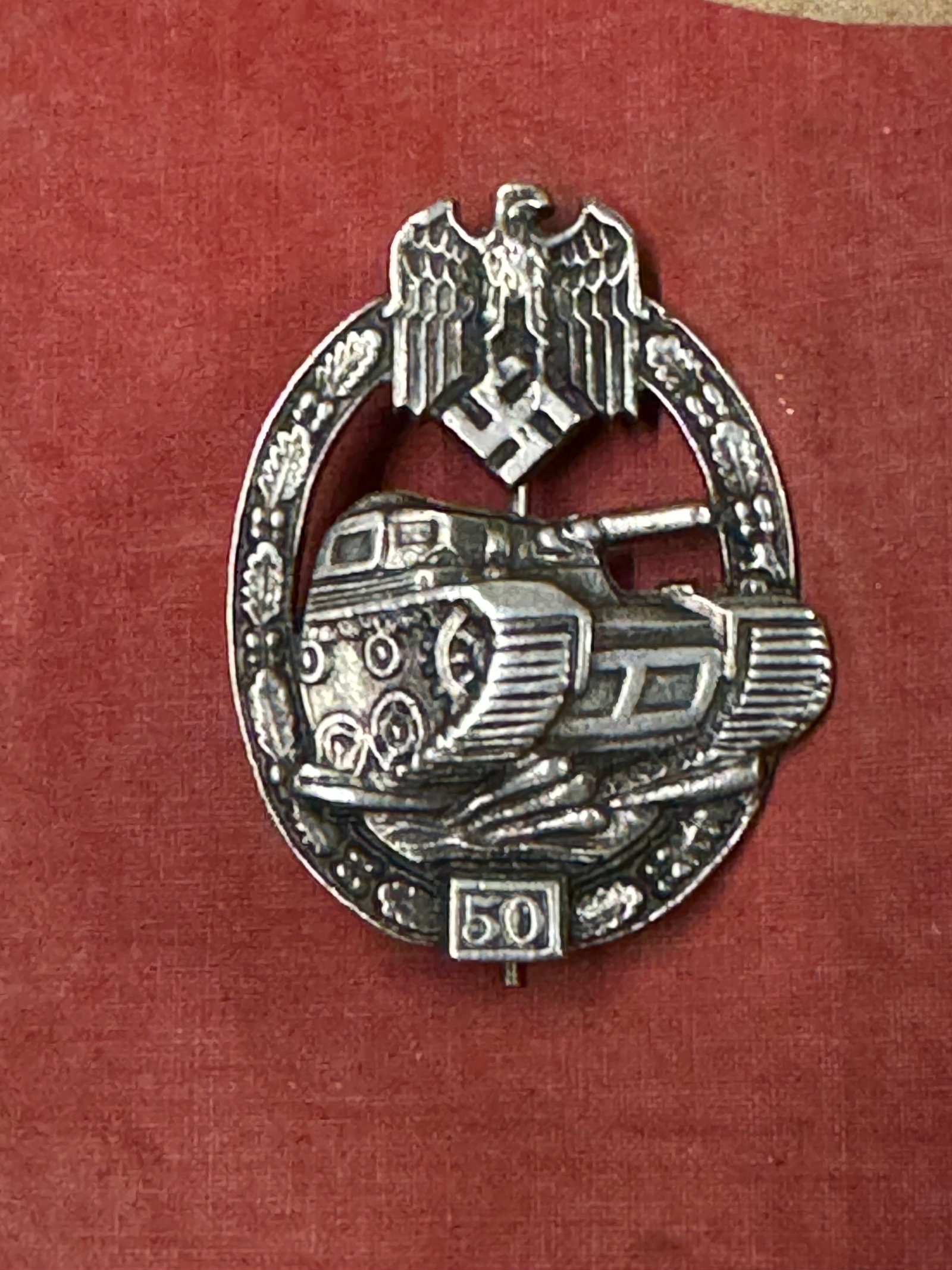 WW2 German Panzer Badge - 50 Assaults: WW2 German Panzer Badge - 50 Assaults. German: Panzerkampfabzeichen) was a World War II German military decoration awarded troops in armoured divisions. It was instituted 20 December 1939.