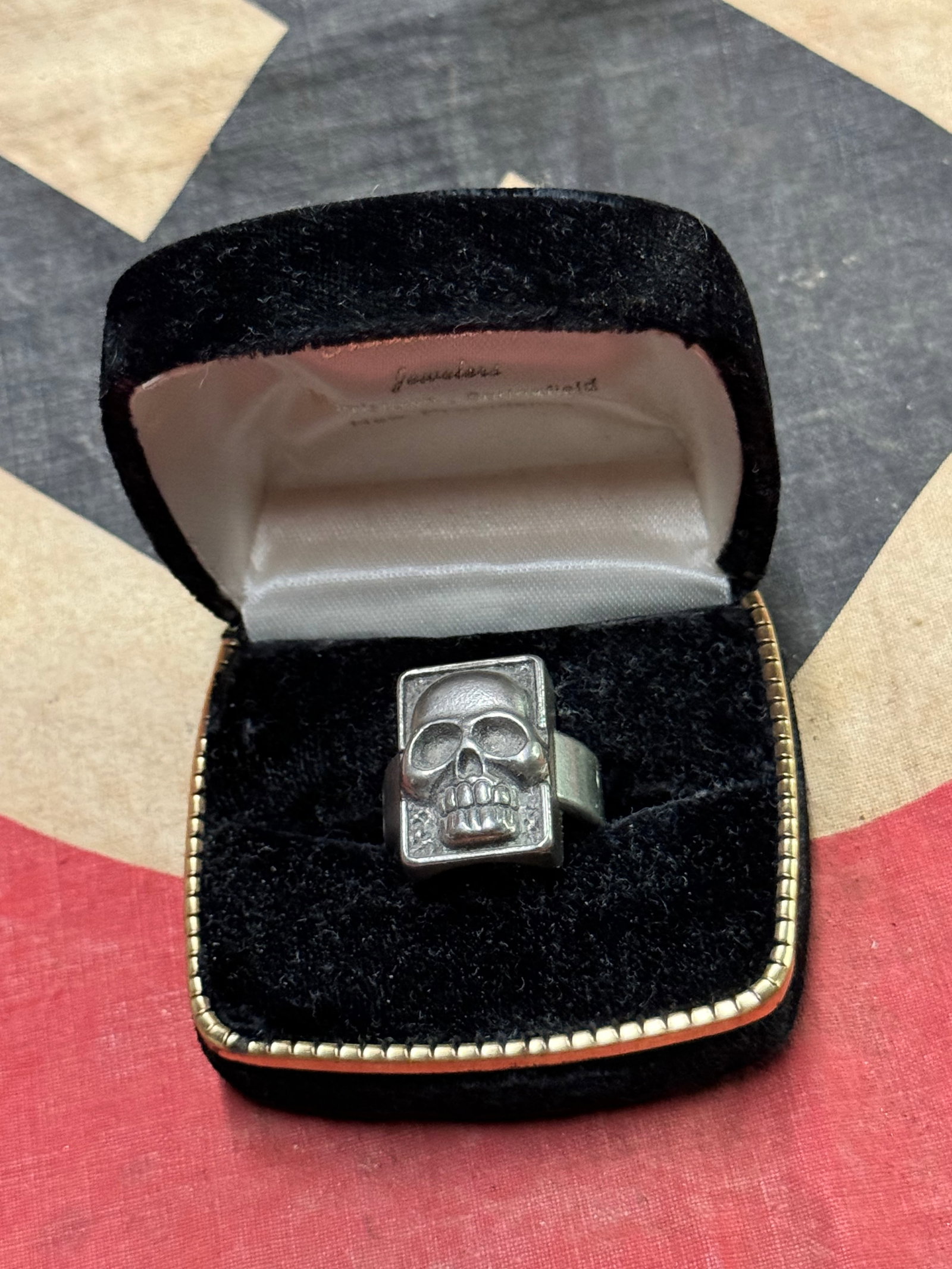 WW2 GERMAN TOTENKOPF SS OFFICER SILVER SKULL RING: WW2 GERMAN TOTENKOPF SS OFFICER SILVER SKULL RING. A RARE FIND. SHOWS GOOD WEAR AND USE WITH A BEAUTIFUL OVERALL PATINA. PLEASE VIEW ALL DETAILED PICTURES. A SCARCE FIND.