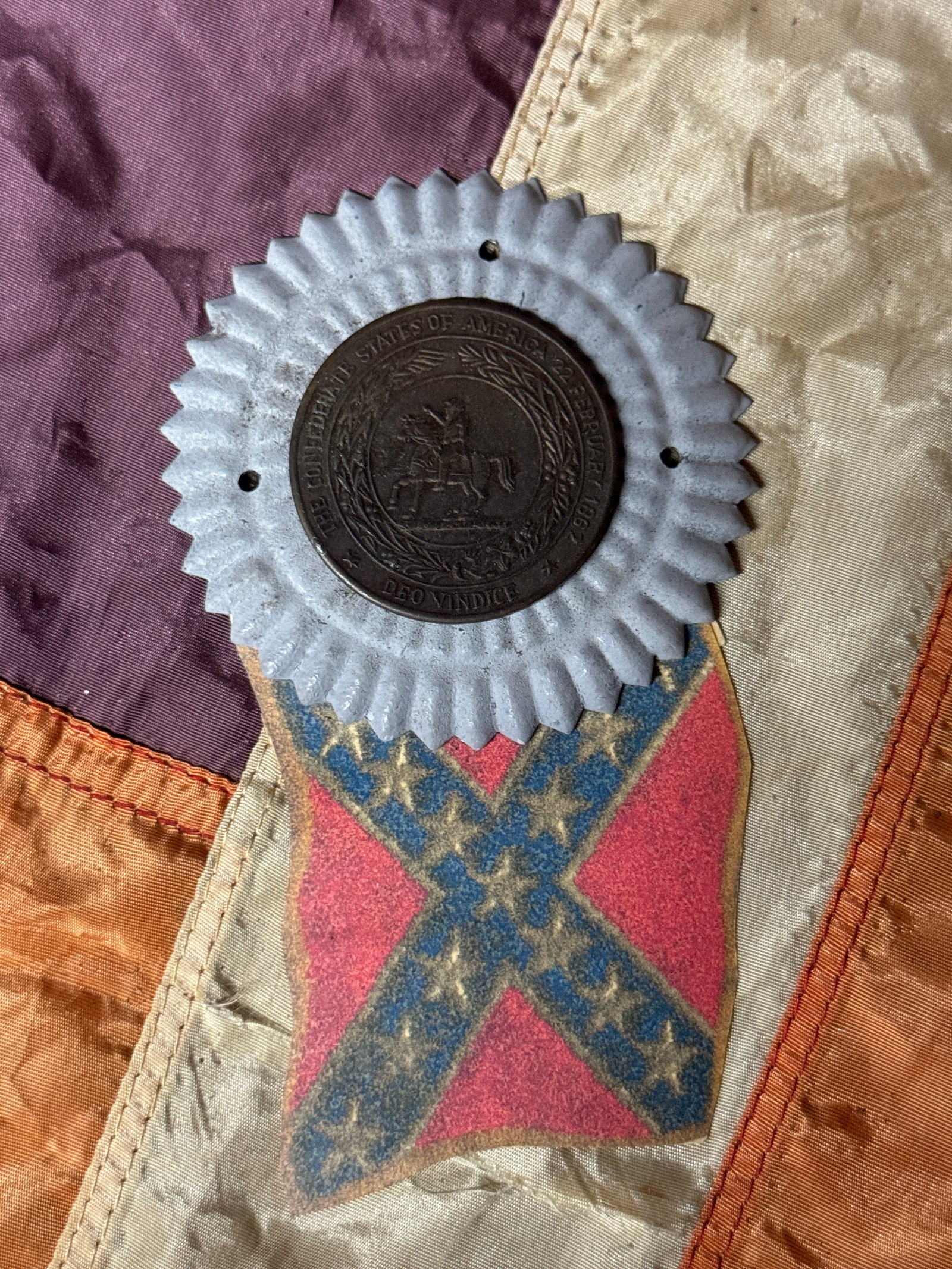 CIVIL WAR CONFEDERATE CSA OFFICER BREAST RIBBON OR HARDEE HAT SIDE COCKADE BADGE: CIVIL WAR CONFEDERATE CSA OFFICER BREAST RIBBON OR HARDEE HAT SIDE COCKADE BADGE. A VERY RARE FIND. SHOWS GOOD WEAR AND USE WITH A BEAUTIFUL OVERALL PATINA. HAS A GREAT LOOK TO IT WITH AN EXCELLENT OV