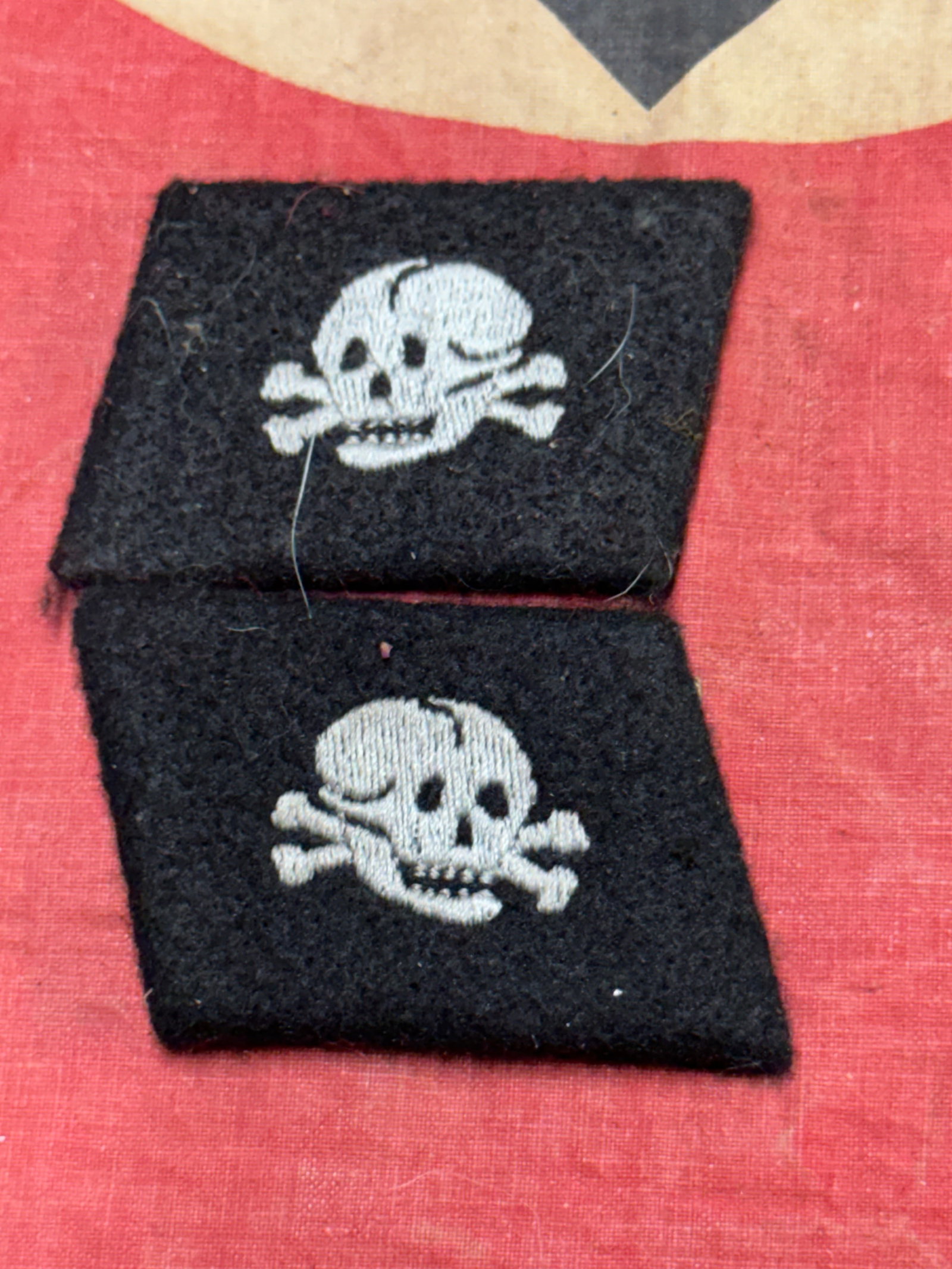 A Scarce WW2 German Waffen-Ss “Pumpkin Head Pattern?? Em/Nco’s Totenkopf Collar Tabs Set - RZM: A Scarce WW2 German Waffen-Ss “Pumpkin Head Pattern” Em/Nco’s Totenkopf Collar Tabs Set - RZM Marked Paper Tag. A extremely well preserved, scarce, and textbook Dachau manufactured Waffen-SS