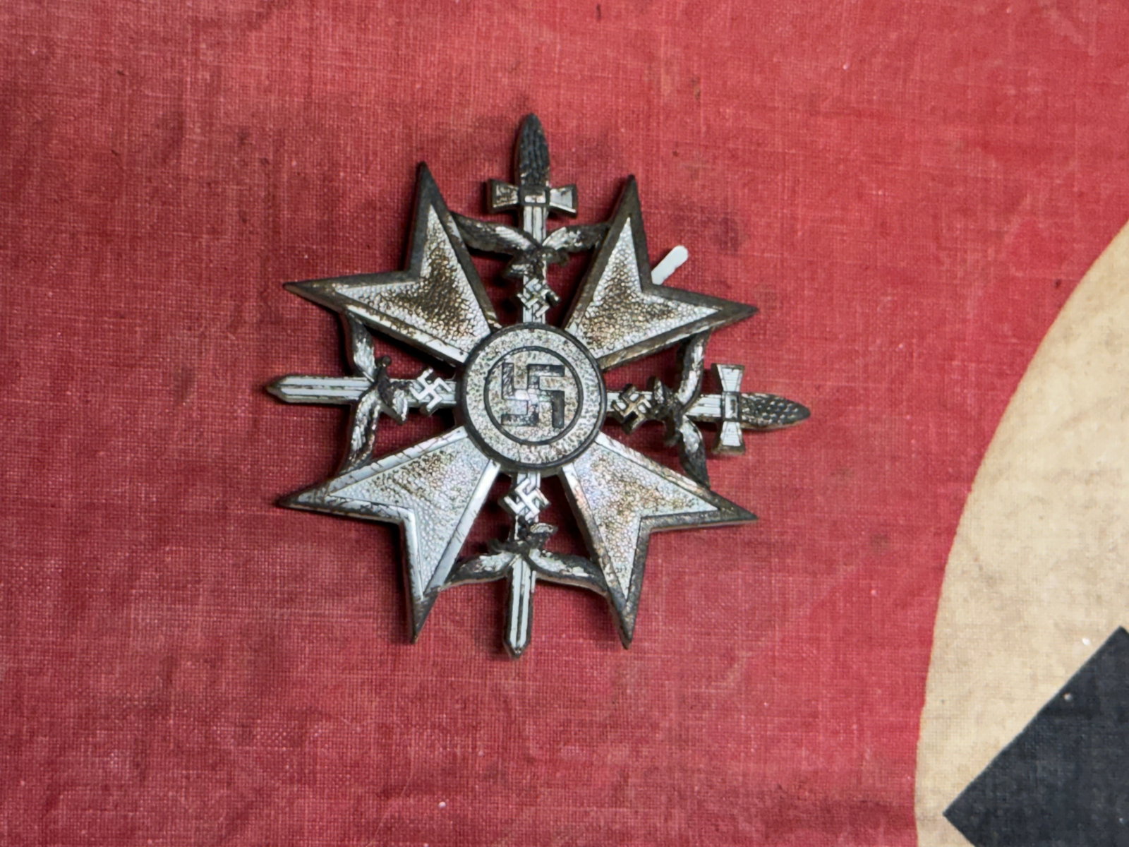 RARE WW2 GERMAN SPANISH CROSS WITH SWORDS IN SILVER: RARE WW2 GERMAN SPANISH CROSS WITH SWORDS IN SILVER. A RARE EXAMPLE. SHOWS GOOD WEAR AND USE WITH A BEAUTIFUL OVERALL PATINA. PLEASE VIEW ALL DETAILED PICTURES. A SCARCE EXAMPLE.