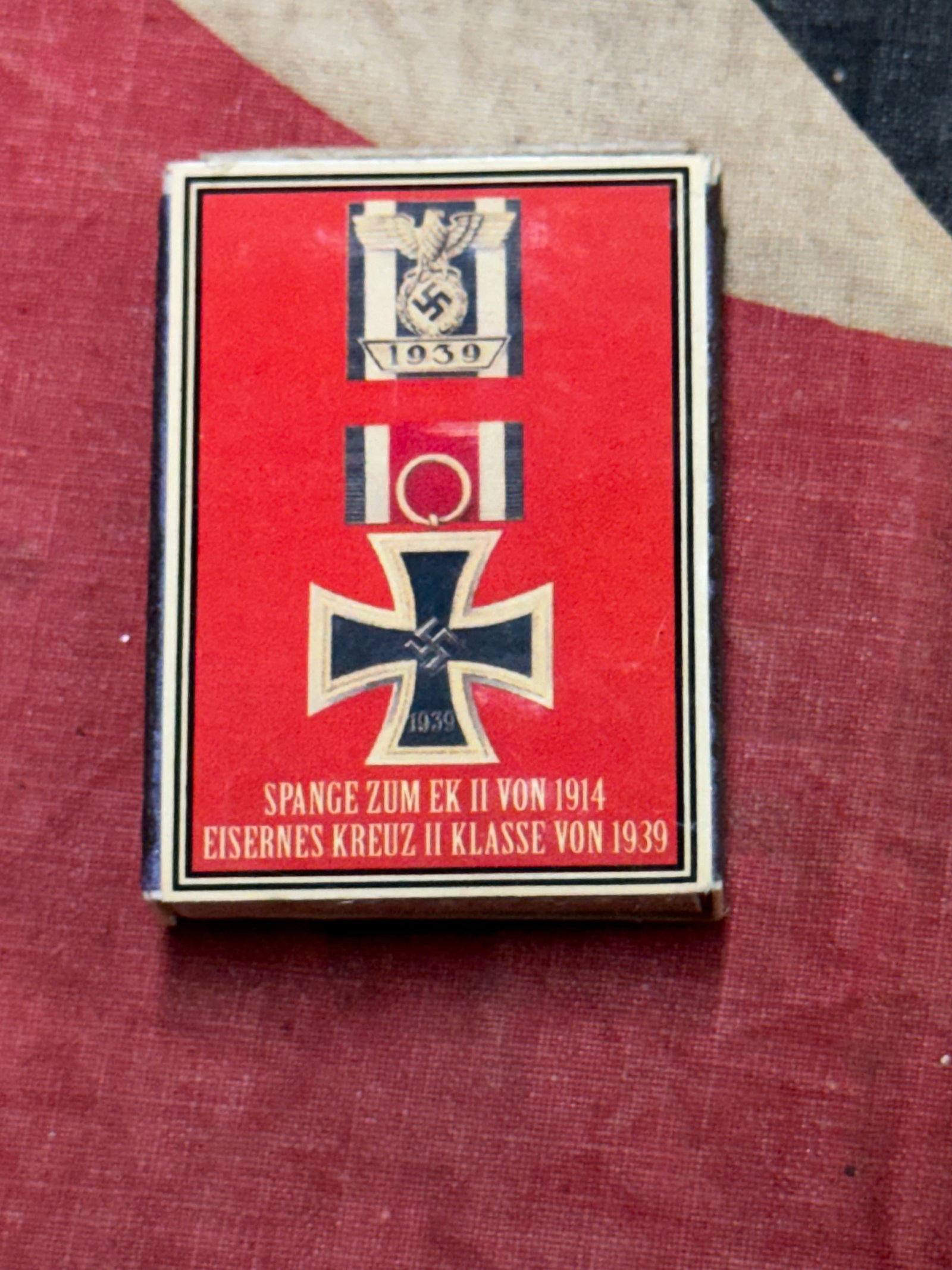 WW2 german EKII with Spange Match Box: WW2 german EKII with Spange Match Box. A rare example. Shows good wear and use with a beautiful overall patina. Please view all detailed pictures. A scarce example.