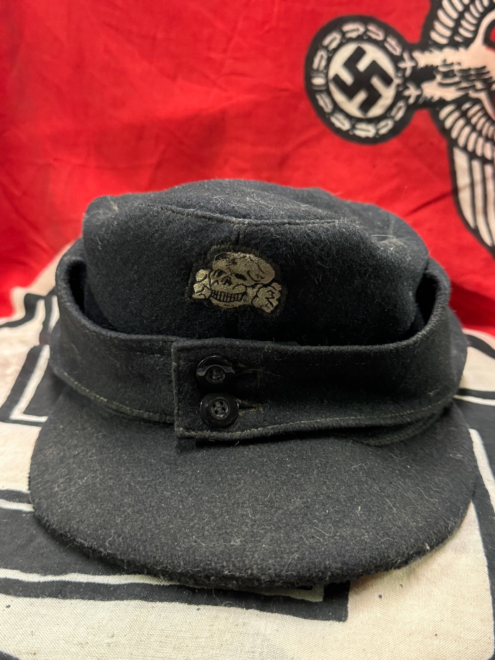 WW2 German SS M43 Officer's Panzer Cap (Einheitsfeldmütze): WW2 German SS M43 Officer's Panzer Cap (Einheitsfeldmütze). A very rare find. Shows good wear and use with a beautiful overall patina. Looks to be very well used during battle. Comes from a collectio