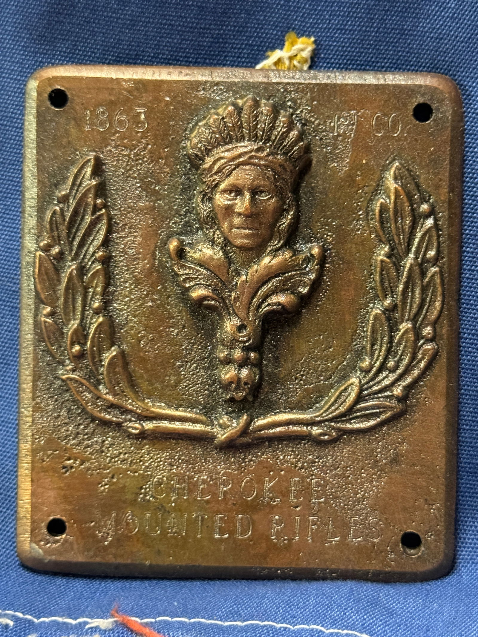 DATED 1863 CIVIL WAR CHEROKEE MOUNTED RIFLES TROOPS PLAQUE BADGE: DATED 1863 CIVIL WAR CHEROKEE MOUNTED RIFLES TROOPS PLAQUE BADGE. A VERY RARE FIND. SHOWS GOOD WEAR AND USE WITH A BEAUTIFUL OVERALL PATINA. HAS A GREAT LOOK TO IT WITH AN EXCELLENT OVERALL EYE APPEAL