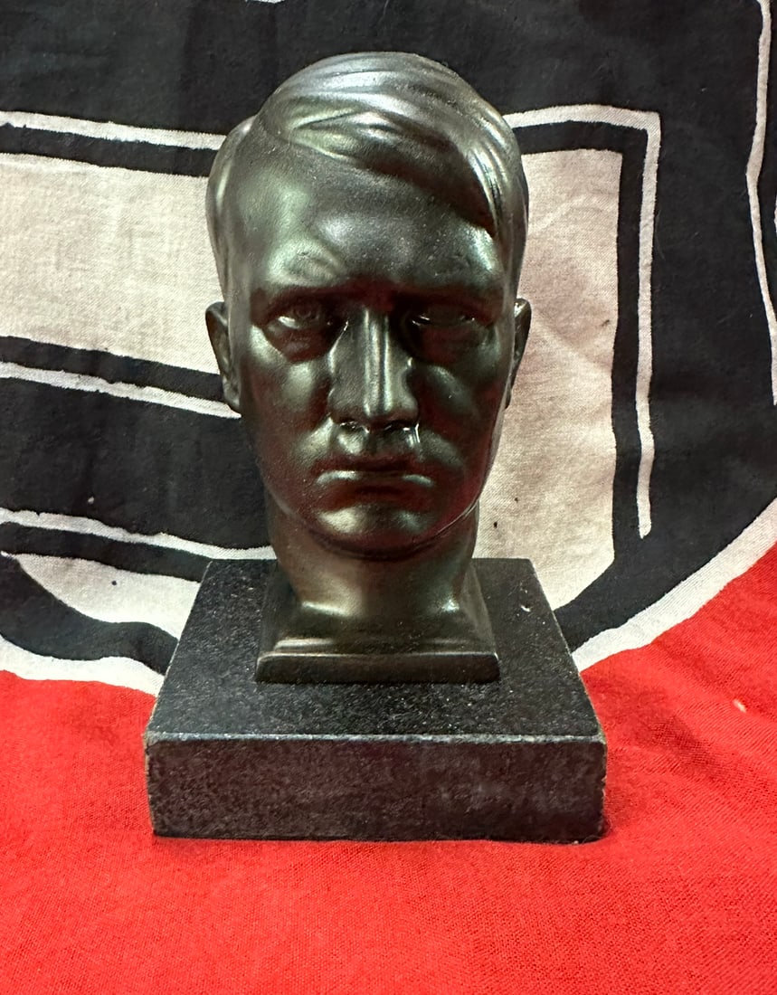 RARE WW2 GERMAN ADOLF HITLER BUST STATUE: RARE WW2 GERMAN ADOLF HITLER BUST STATUE. A VERY RARE FIND. SHOWS GOOD PATINA THROUGHOUT. COMES FROM A COLLECTION. A VERY RARE EXAMPLE.