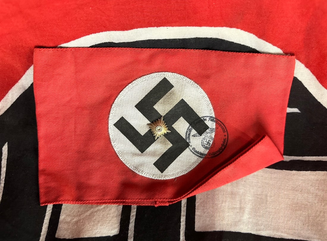 WW2 GERMAN NSDAP LEADER ARMBAND WITH INSPECTION STAMP AND RZM PAPER TAG: WW2 GERMAN NSDAP LEADER ARMBAND WITH INSPECTION STAMP AND RZM PAPER TAG. AN ULTRA RARE FIND SHOWING GOOD WEAR AND USE WITH A BEAUTIFUL OVERALL PATINA. PLEASE VIEW ALL DETAILED PICTURES. A VERY RARE EX