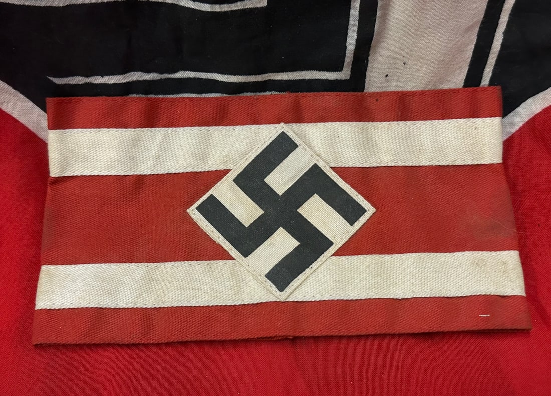 SCARCE WW2 GERMAN HITLER YOUTH LEADER'S ARMBAND WITH RZM PAPER TAG: SCARCE WW2 GERMAN HITLER YOUTH LEADER'S ARMBAND WITH RZM PAPER TAG. A RARE EXAMPLE THAT IS IN MINT OVERALL SHAPE AND CONDITION WITH A BEAUTIFUL OVERALL PATINA. PLEASE VIEW ALL DETAILED PICTURES. A SCA