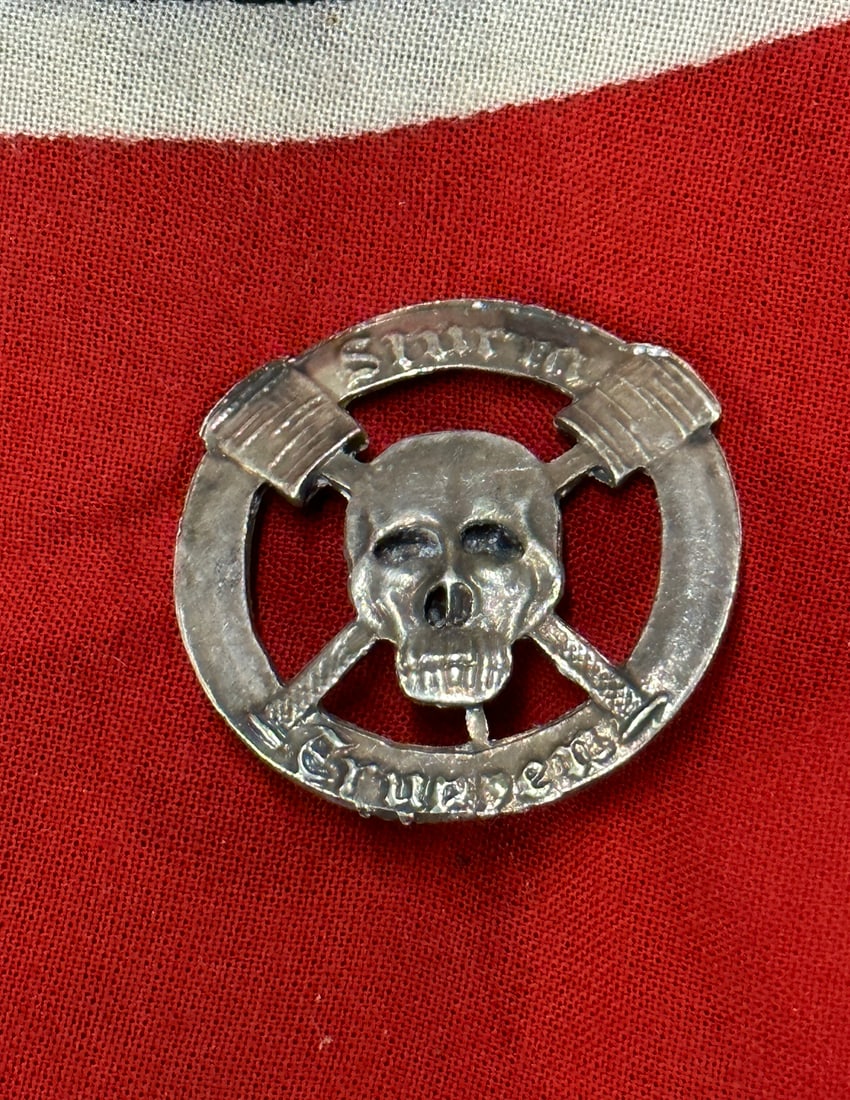 RARE WW1 GERMAN STURMTRUPPEN SILVER BADGE: RARE WW1 GERMAN STURMTRUPPEN SILVER BADGE. A SCARCE EXAMPLE THAT IS IN MINT OVERALL SHAPE AND CONDITION WITH A BEAUTIFUL OVERALL PATINA. PLEASE VIEW ALL DETAILED PICTURES. A SCARCE EXAMPLE.