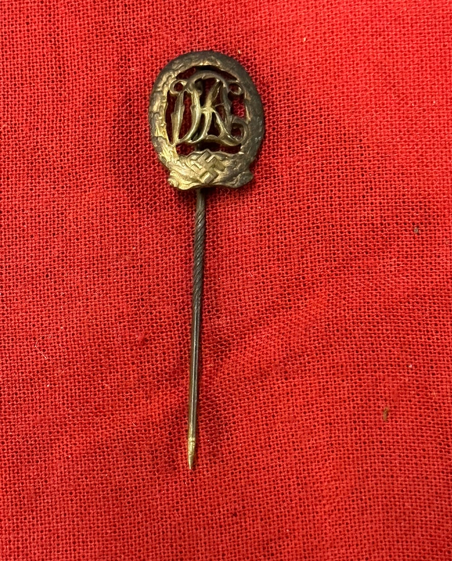 WW2 DRL Sports Badge in Bronze Stickpin - Maker Marked: WW2 DRL Sports Badge in Bronze Stickpin - Maker Marked. A rare find. Shows good wear and use. Please view all detailed pictures. A scarce example.