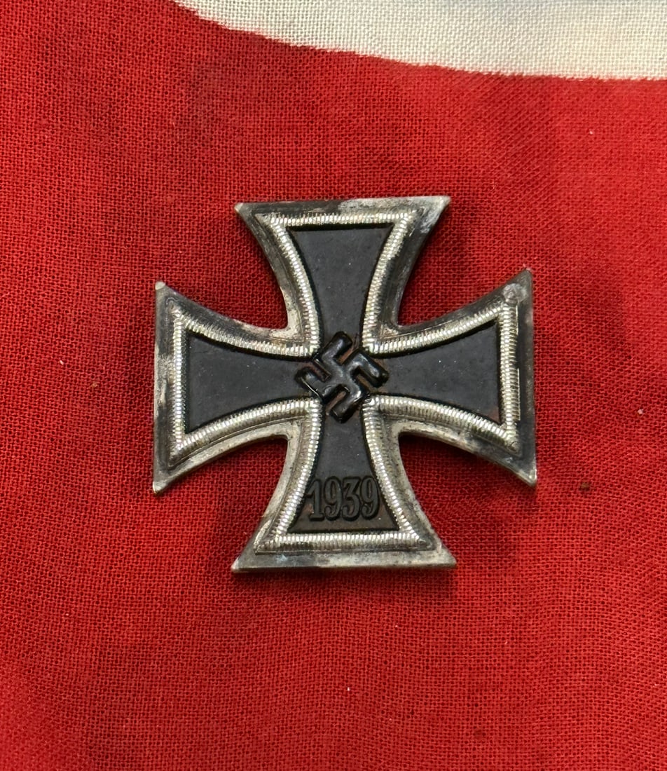 RARE WW2 GERMAN IRON CROSS 1ST CLASS MARKED 50: RARE WW2 GERMAN IRON CROSS 1ST CLASS MARKED 50. A VERY SCARCE ITEM. SHOWS GOOD WEAR AND USE. PLEASE VIEW ALL DETAILED PICTURES. A SCARCE ITEM.