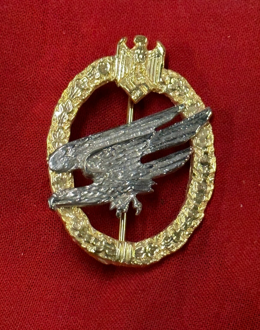 WW2 German Fallschirmjager Badge: WW2 German Fallschirmjager Badge. A rare find. Shows good wear and use with a beautiful overall patina. Please view all detailed pictures. A scarce item.