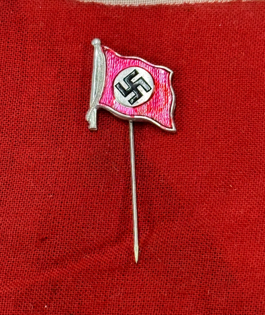 WW2 GERMAN FLAG STICKPIN BY CARL WILD: WW2 GERMAN FLAG STICKPIN BY CARL WILD. A RARE FIND. SHOWS GOOD WEAR AND USE WITH A BEAUTIFUL OVERALL PATINA. PLEASE VIEW ALL DETAILED PICTURES. A SCARCE EXAMPLE.