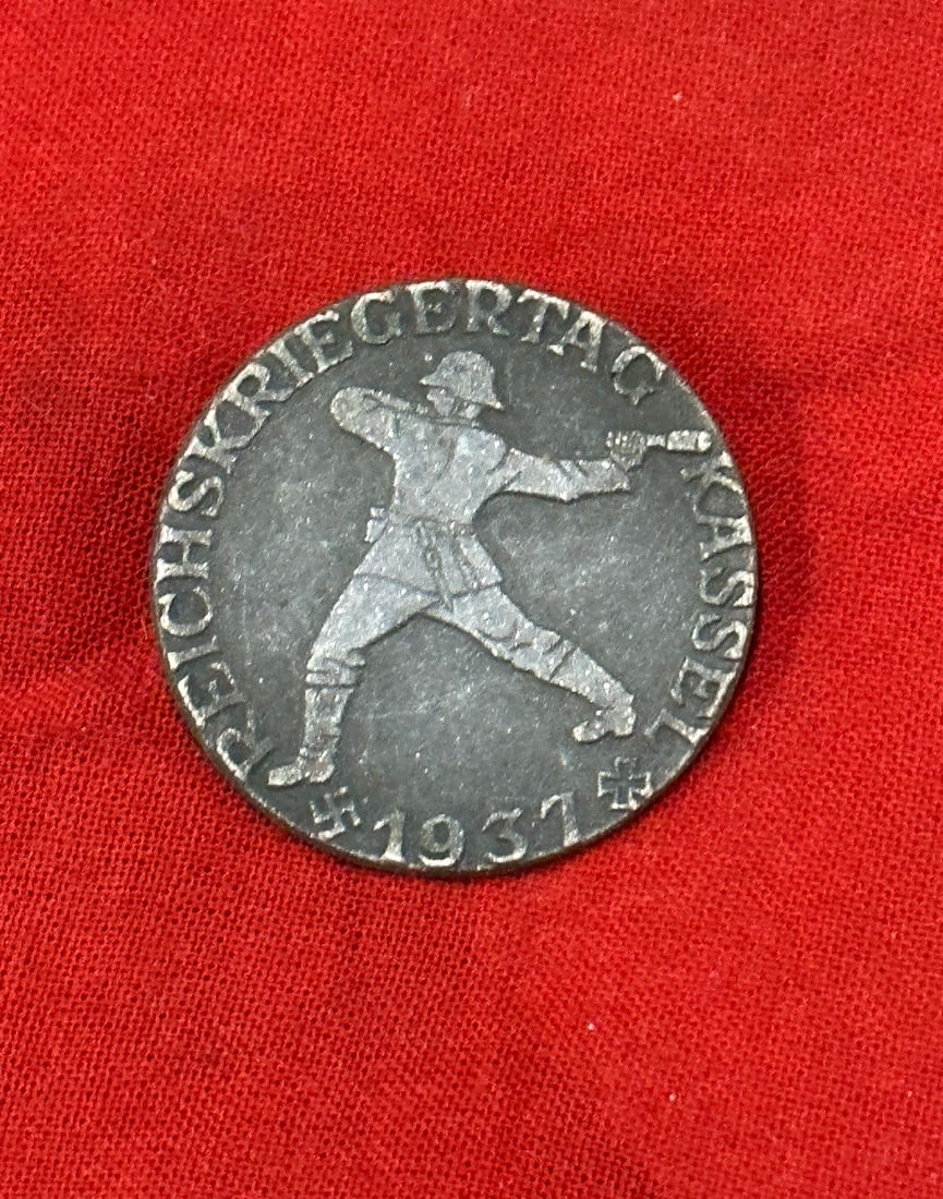 WW2 German Reichskriegertag Kassel 1937 badge: WW2 German Reichskriegertag Kassel 1937 badge. On the back maker marked with C. Poellath Schrobenhausen.