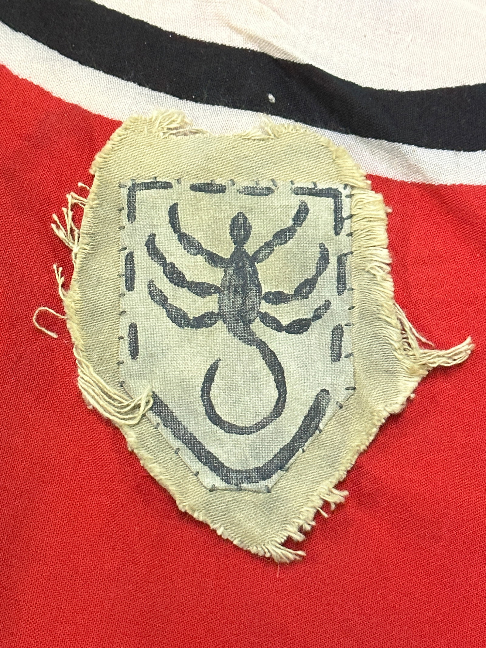 WW2 GERMAN AFRIKA KORPS FALLSCHIRMJAGER SCORPIAN PATCH - RAMCKE BRIGADE: WW2 GERMAN AFRIKA KORPS FALLSCHIRMJAGER SCORPIAN PATCH - RAMCKE BRIGADE. A VERY RARE EXAMPLE THAT IS IN MINT OVERALL SHAPE AND CONDITION WITH A BEAUTIFUL OVERALL PATINA. PLEASE VIEW ALL DETAILED PICTU