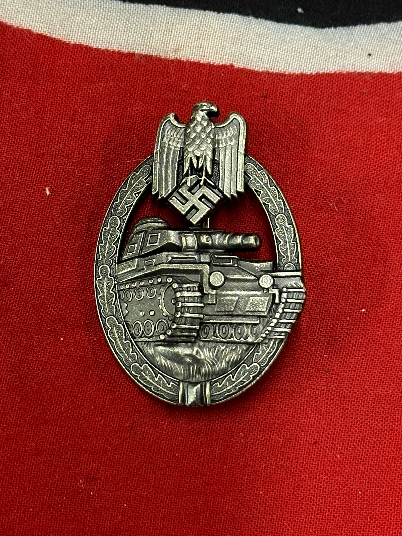 RARE WW2 GERMAN PANZER ASSAULT BADGE IN BRONZE BY ASSMANN: RARE WW2 GERMAN PANZER ASSAULT BADGE IN BRONZE BY ASSMANN. A SCARCE EXAMPLE MADE OUT OF ZINC. SHOWS GOOD WEAR AND USE WITH A BEAUTIFUL OVERALL PATINA. PLEASE VIEW ALL DETAILED PICTURES. A RARE FIND.