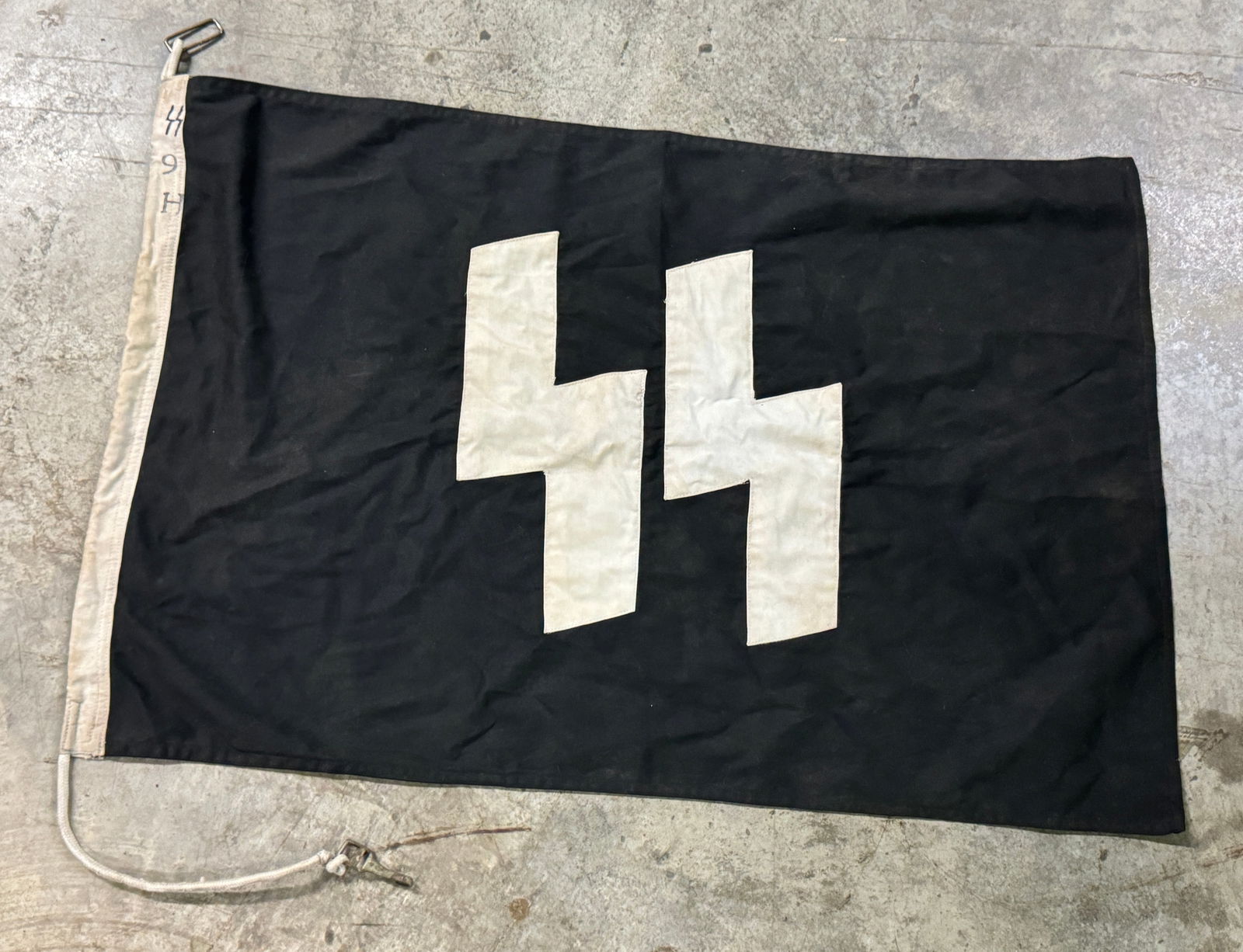 RARE WW2 GERMAN WAFFEN SS FLAG MARKED SS 9 H: RARE WW2 GERMAN WAFFEN SS FLAG MARKED SS 9 H. AN ULTRA RARE FIND THAT IS IN MINT OVERALL SHAPE AND CONDITION WITH A BEAUTIFUL OVERALL PATINA. SHOWS GOOD WEAR AND USE. PLEASE VIEW ALL DETAILED PICTURES