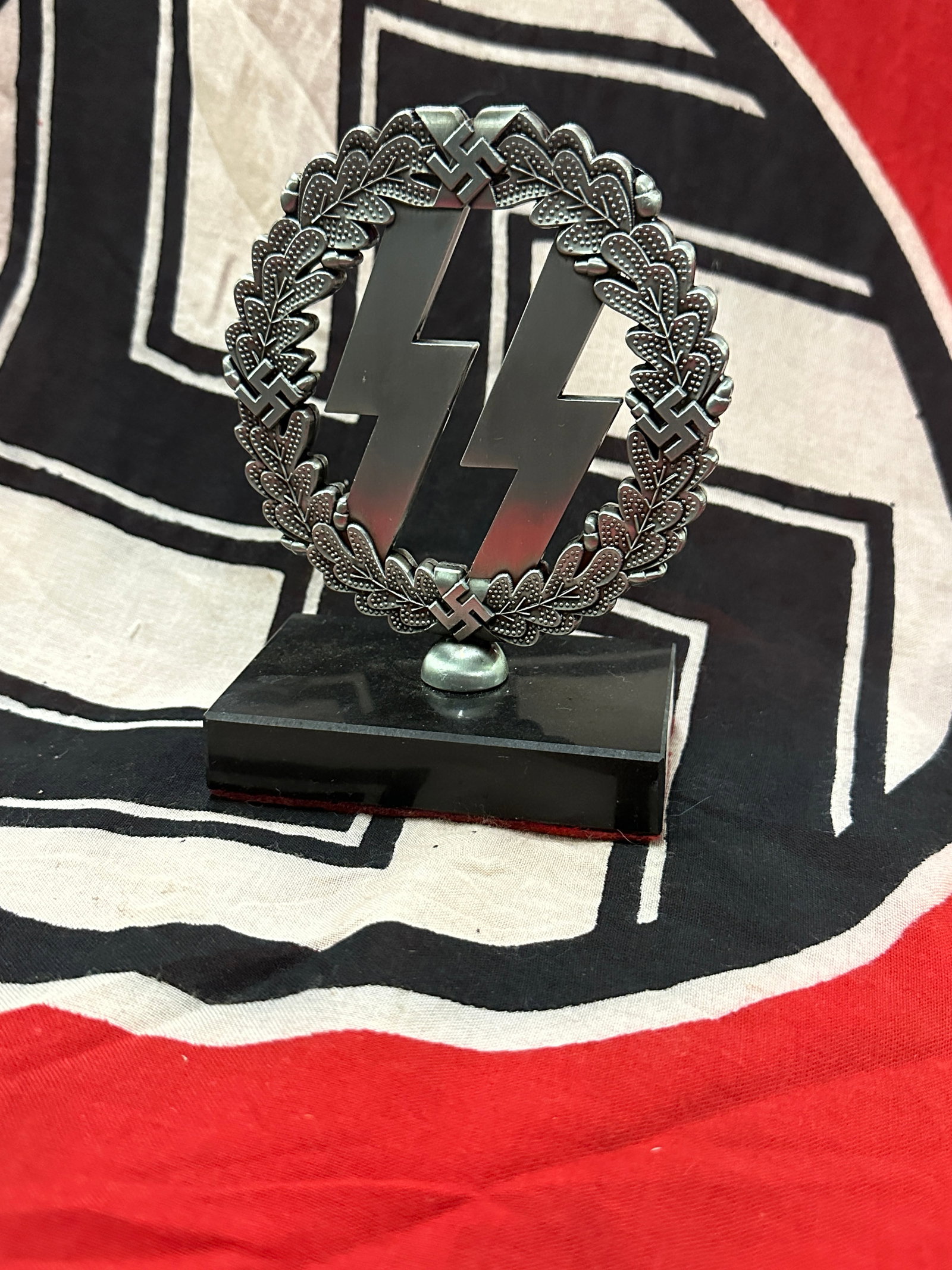 SCARCE WW2 GERMAN WAFFEN SS RUNES OFFICER DESK ORNAMENT WITH RZM CLOTH MAKER MARK: SCARCE WW2 GERMAN WAFFEN SS RUNES OFFICER DESK ORNAMENT WITH RZM CLOTH MAKER MARK. A VERY RARE FIND. SHOWS GOOD WEAR AND USE WITH A BEAUTIFUL OVERALL PATINA. A VERY WELL MADE ANTIQUE GERMAN ARTIFACT. 
