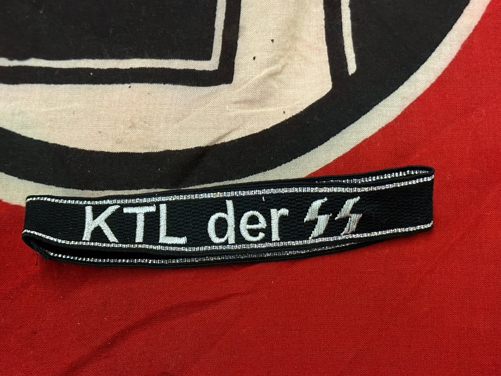 RARE WW2 GERMAN WAFFEN SS KTL DER CUFF TITLE: RARE WW2 GERMAN WAFFEN SS KTL DER CUFF TITLE. A VERY RARE FIND. SHOWS GOOD WEAR AND USE WITH A BEAUTIFUL OVERALL PATINA. A VERY WELL MADE ANTIQUE GERMAN ARTIFACT. PLEASE VIEW ALL DETAILED PICTURES.