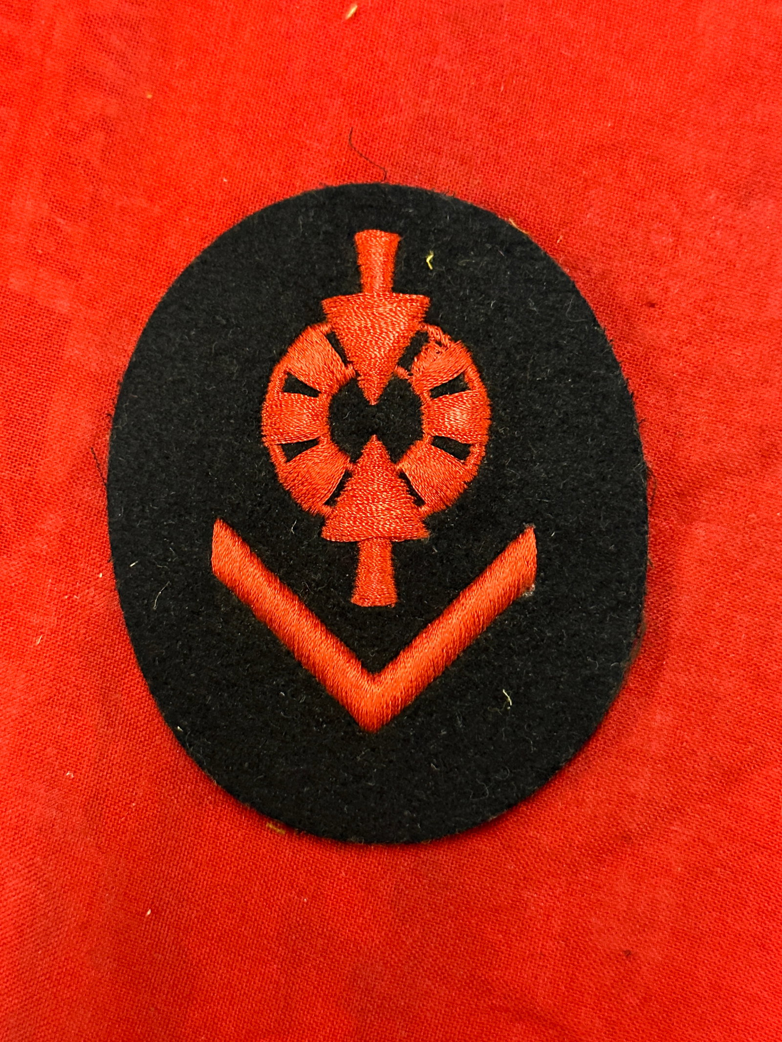 WWII German Kriegsmarine Weapons control foreman artillery AA coastal guns specialty trade insignia: WWII German Kriegsmarine Weapons control foreman artillery AA coastal guns specialty trade insignia. Machine embroidery. Navy blue wool back board.
