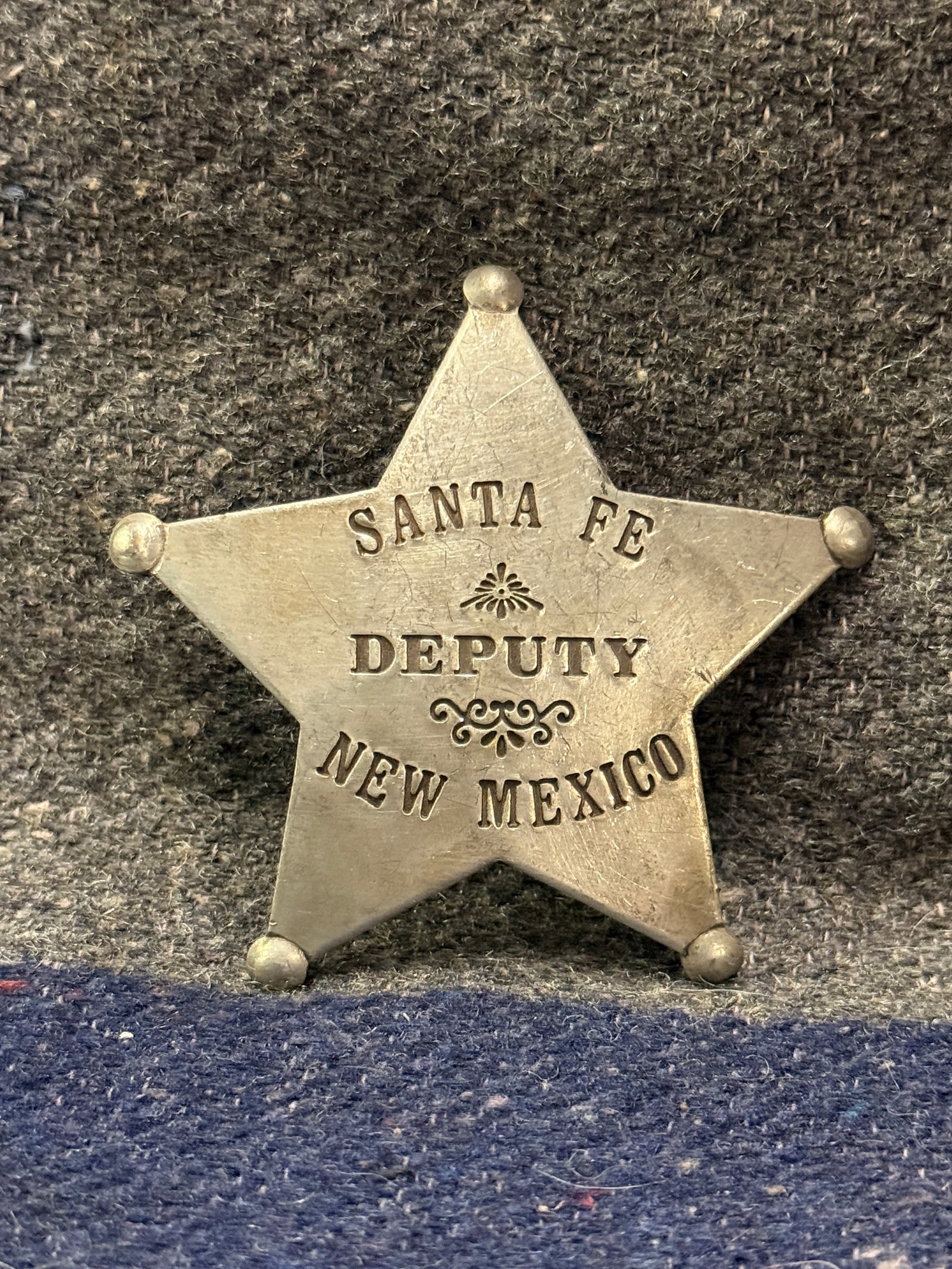ANTIQUE 1800'S SANTA FE DEPUTY NEW MEXICO BADGE: ANTIQUE 1800'S SANTA FE DEPUTY NEW MEXICO BADGE. Shows good wear and use with a beautiful overall patina. Has a great look to it with an excellent overall eye appeal. Please view all detailed pictures