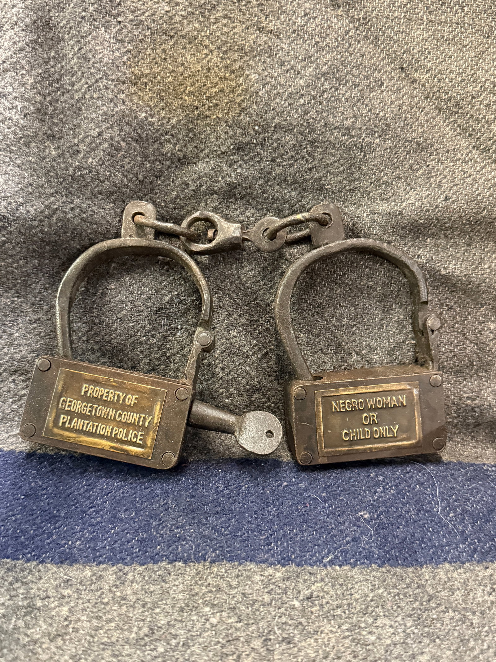1800'S PLANTION POLICE GEORGETOWN CUFFS SLAVE SHACKLES: 1800'S PLANTION POLICE GEORGETOWN CUFFS SLAVE SHACKLES. A VERY RARE FIND. SHOWS GOOD WEAR AND USE WITH A BEAUTIFUL OVERALL PATINA. PLEASE VIEW ALL DETAILED PICTURES. A VERY RARE FIND.