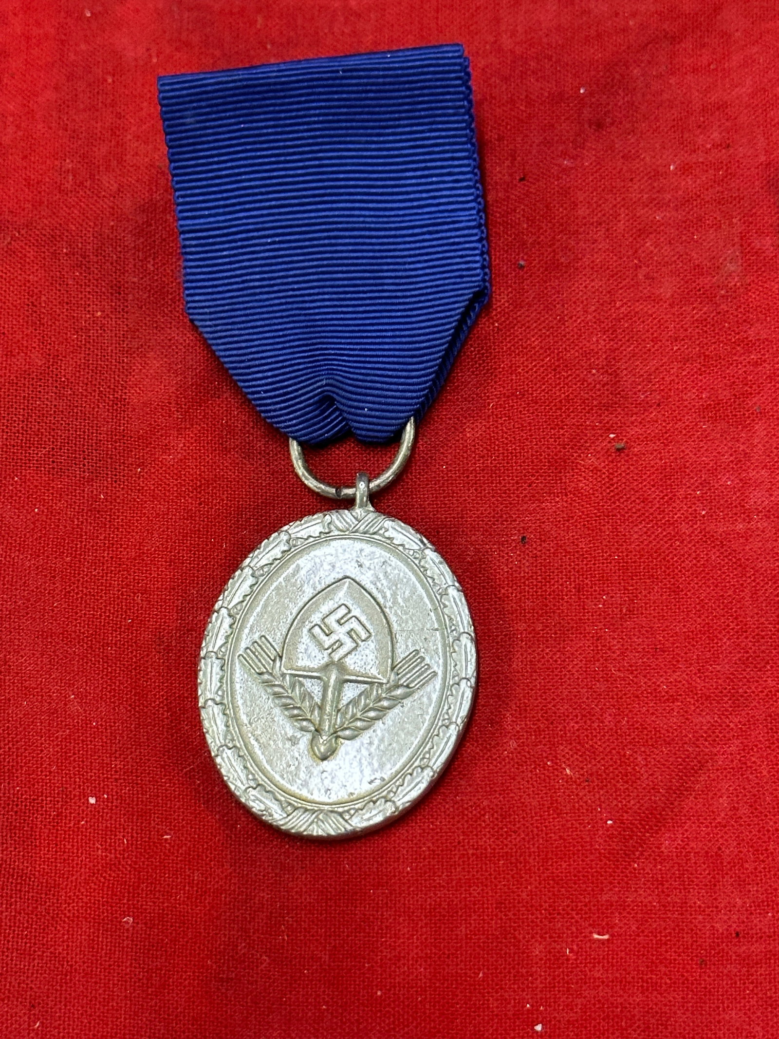 RARE WW2 GERMAN RAD Labor Corps 12 Year Service Medal: Rare WW2 German RAD Labor Corps 12 Year Service Medal. Overall very nice medal with much of the original frosted color. The ribbon is clean and the color is nice.