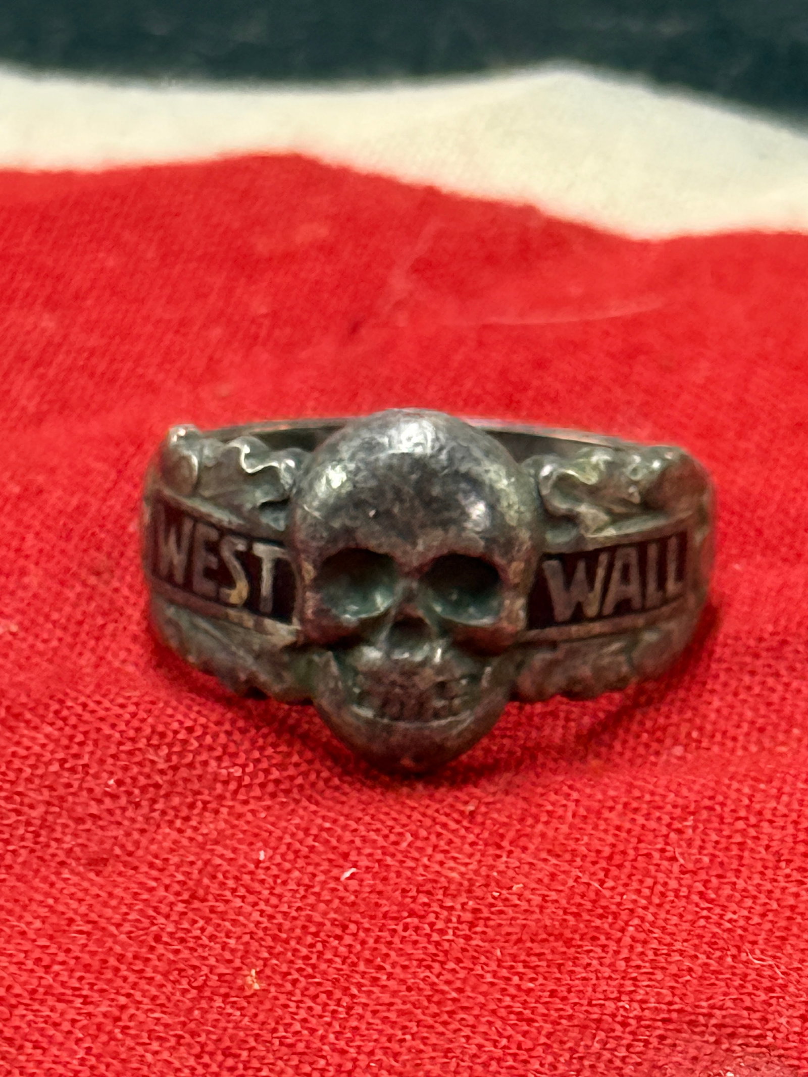 WW2 GERMAN TOTENKOPF SS DEATH SKULL WEST WALL SILVER RING: WW2 GERMAN TOTENKOPF SS DEATH SKULL WEST WALL SILVER RING. A SCARCE FIND. SHOWS GOOD WEAR AND USE WITH A BEAUTIFUL OVERALL PATINA. PLEASE VIEW ALL DETAILED PICTURES. A SCARCE FIND.