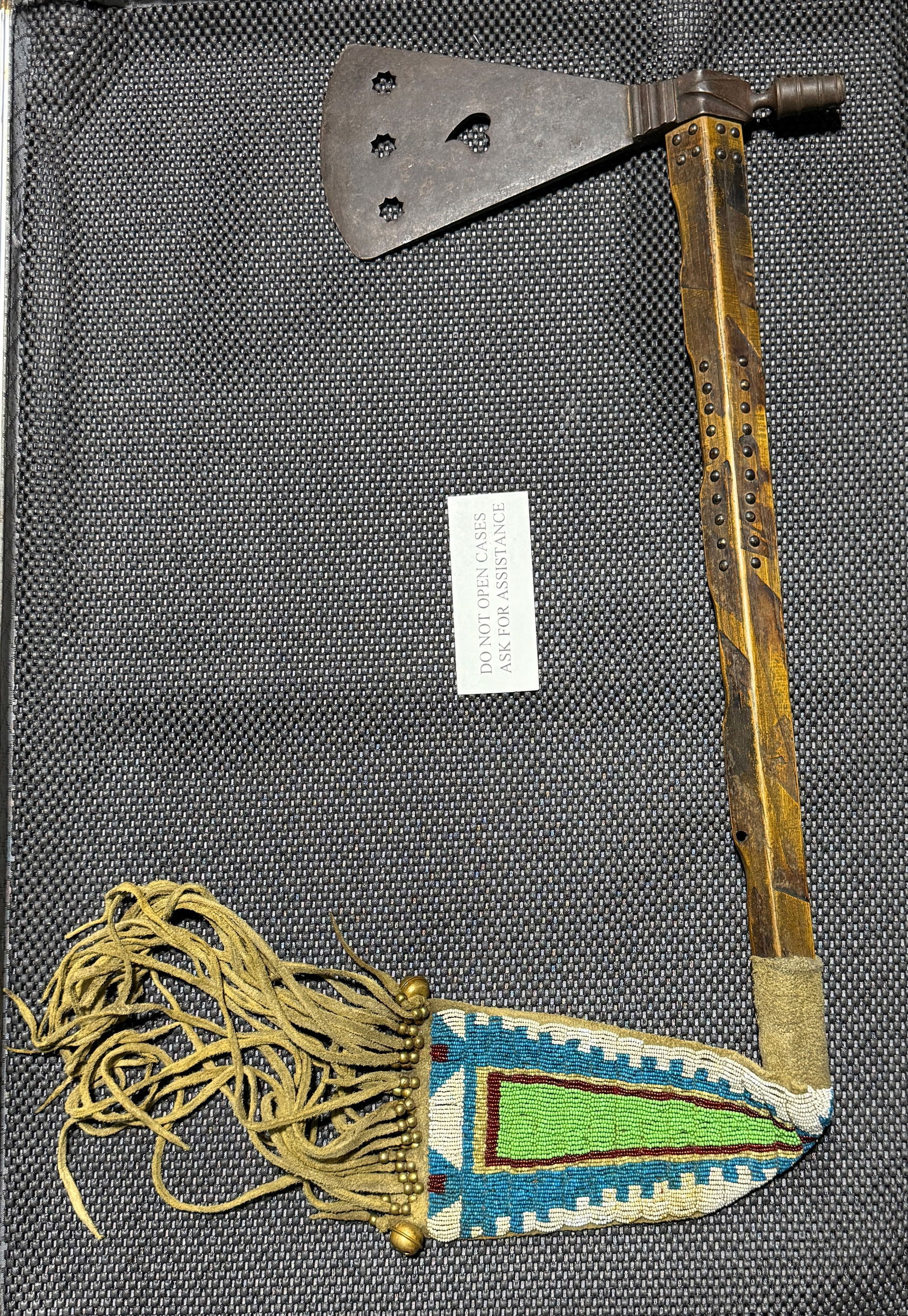 1800'S NATIVE AMERICAN SIOUX INDIANS WEEPING HEART PIPE TOMAHAWK W/ BEADED DROP: 1800'S NATIVE AMERICAN SIOUX INDIANS WEEPING HEART PIPE TOMAHAWK W/ BEADED DROP. AN ULTRA RARE FIND. SHOWS GOOD WEAR AND USE WITH A BEAUTIFUL OVERALL PATINA. HAS A GREAT LOOK TO IT WITH AN EXCELLENT O