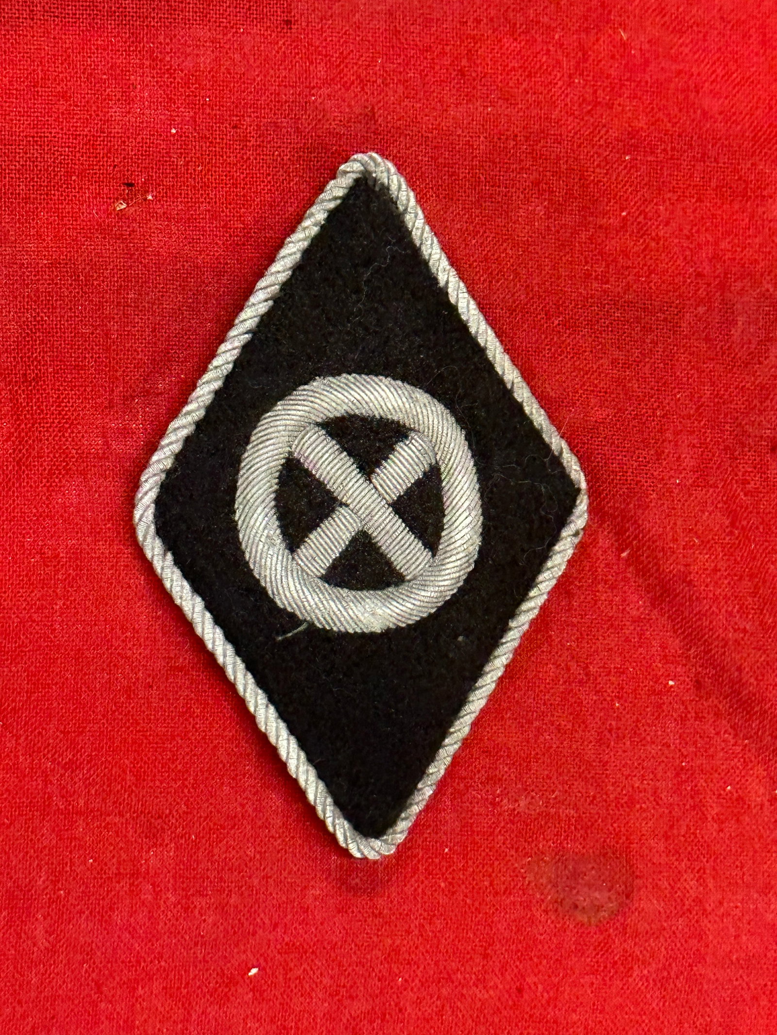 WW2 German Waffen- SS French Volunteer “Charlemagne?? Collar Tab: WW2 German Waffen- SS French Volunteer “Charlemagne” Collar Tab. There were very few French in the Waffen-SS and more collar tabs were produced than needed with this being a typical pickup fro
