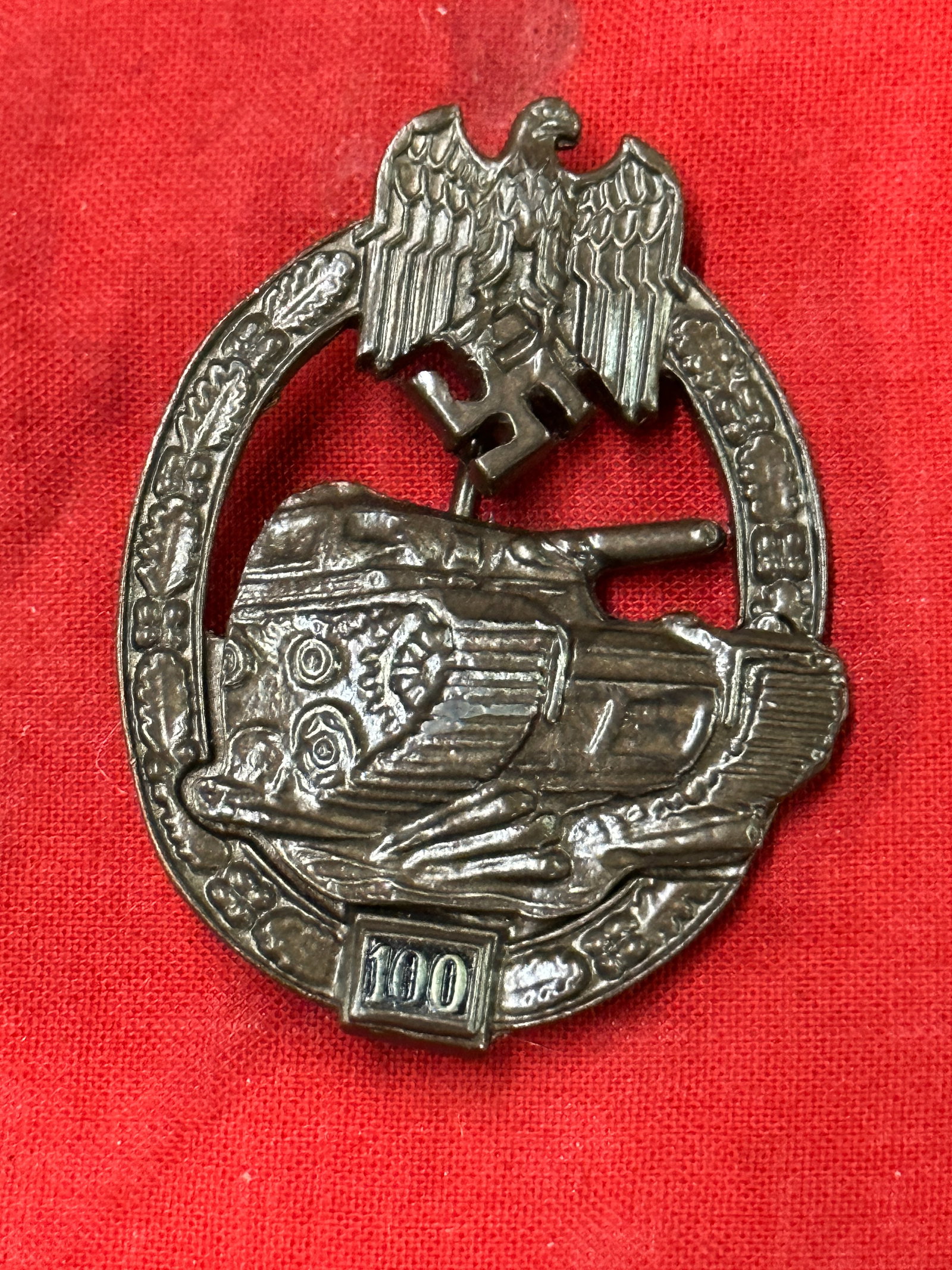 WW2 GERMAN PANZER ASSAULT BADGE FOR 100 ENGAGEMENTS: WW2 GERMAN PANZER ASSAULT BADGE FOR 100 ENGAGEMENTS. A VERY RARE FIND. SHOWS GOOD WEAR AND USE WITH A BEAUTIFUL OVERALL PATINA. PLEASE VIEW ALL DETAILED PICTURES. A VERY SCARCE EXAMPLE.