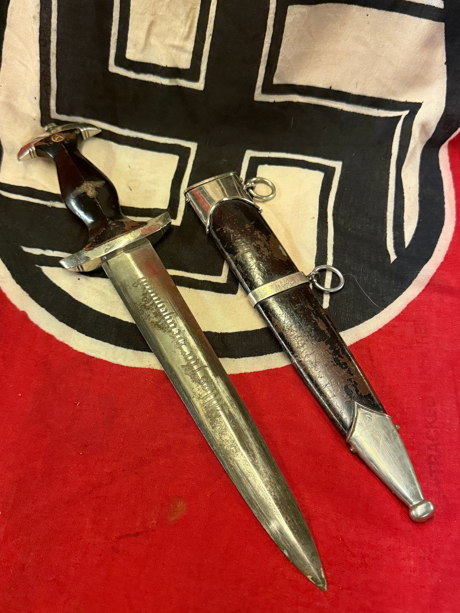 WW2 GERMAN SA DAGGER BY RZM M7/13: WW2 GERMAN SA DAGGER BY RZM M7/13. AN ULTRA RARE FIND THAT IS IN MINT OVERALL SHAPE AND CONDITION WITH A BEAUTIFUL OVERALL PAITNA. ETCHED BLADE "ULLES FUR DEUTSCHLAND". SHOWS EXCESSIVE WEAR AND HEAVY