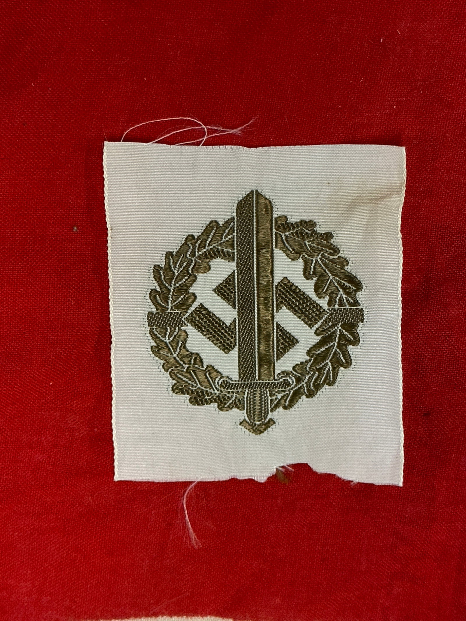 WW2 German SA Cloth Sports Badge in Bronze: WW2 German SA Cloth Sports Badge in Bronze. Beautiful cloth edition in mint shape and condition with period patina. Please view all detailed pictures. A scarce find.