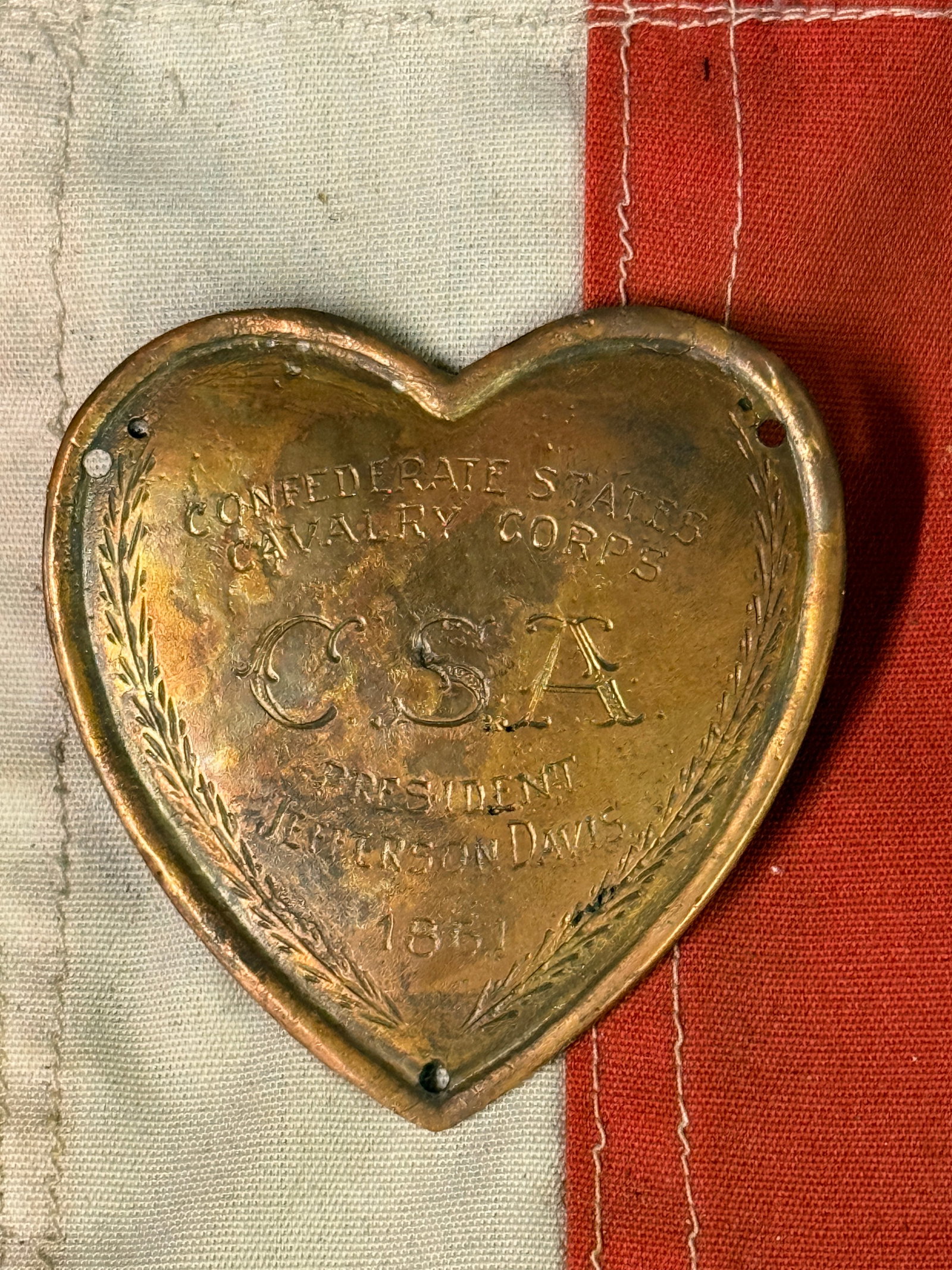 CIVIL WAR CSA CAVALRY CORPS JEFFERSON DAVIS FOR PRESIDENT 1861 MARTINGALE PLATE: CIVIL WAR CSA CAVALRY CORPS JEFFERSON DAVIS FOR PRESIDENT 1861 MARTINGALE PLATE. AN ULTRA RARE FIND THAT IS IN MINT OVERALL SHAPE AND CONDITION WITH A BEAUTIFUL OVERALL PATINA. SHOWS GOOD WEAR AND USE