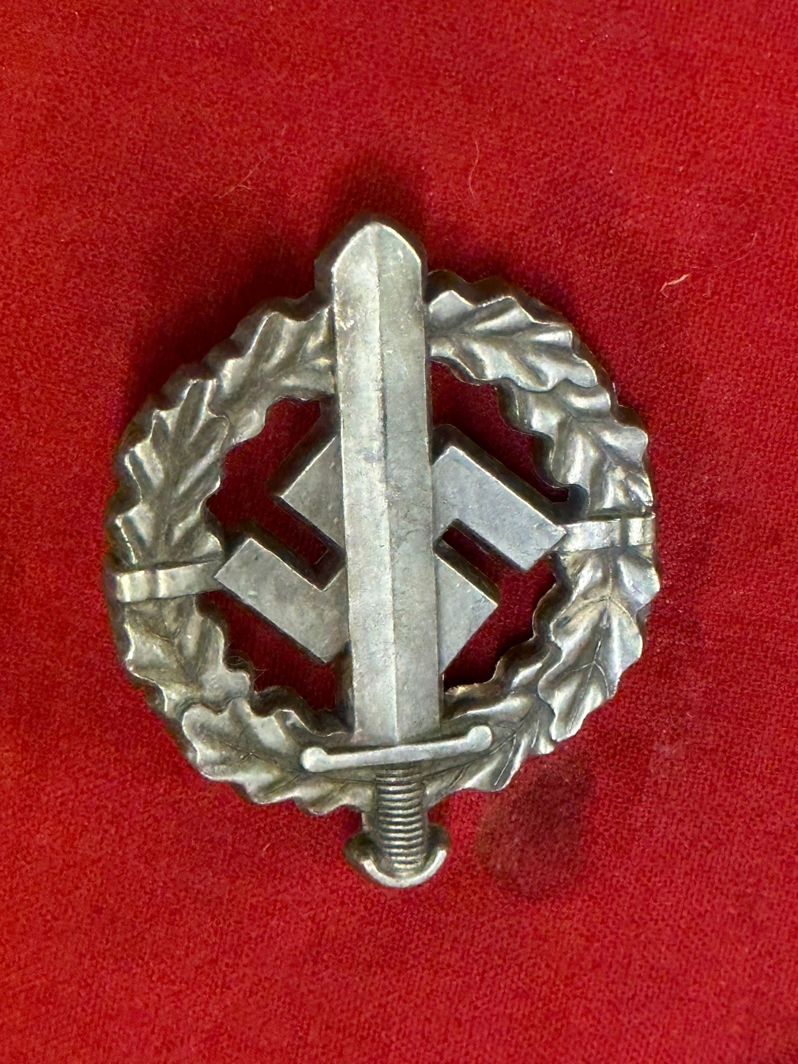 WWII German SA Silver Sports Badge By W.REDO: WWII German SA Silver Sports Badge, third pattern, hallmarked on the reverse W. REDO, SAAR LAUTERNE igentum der Obersten S.A. Führung.