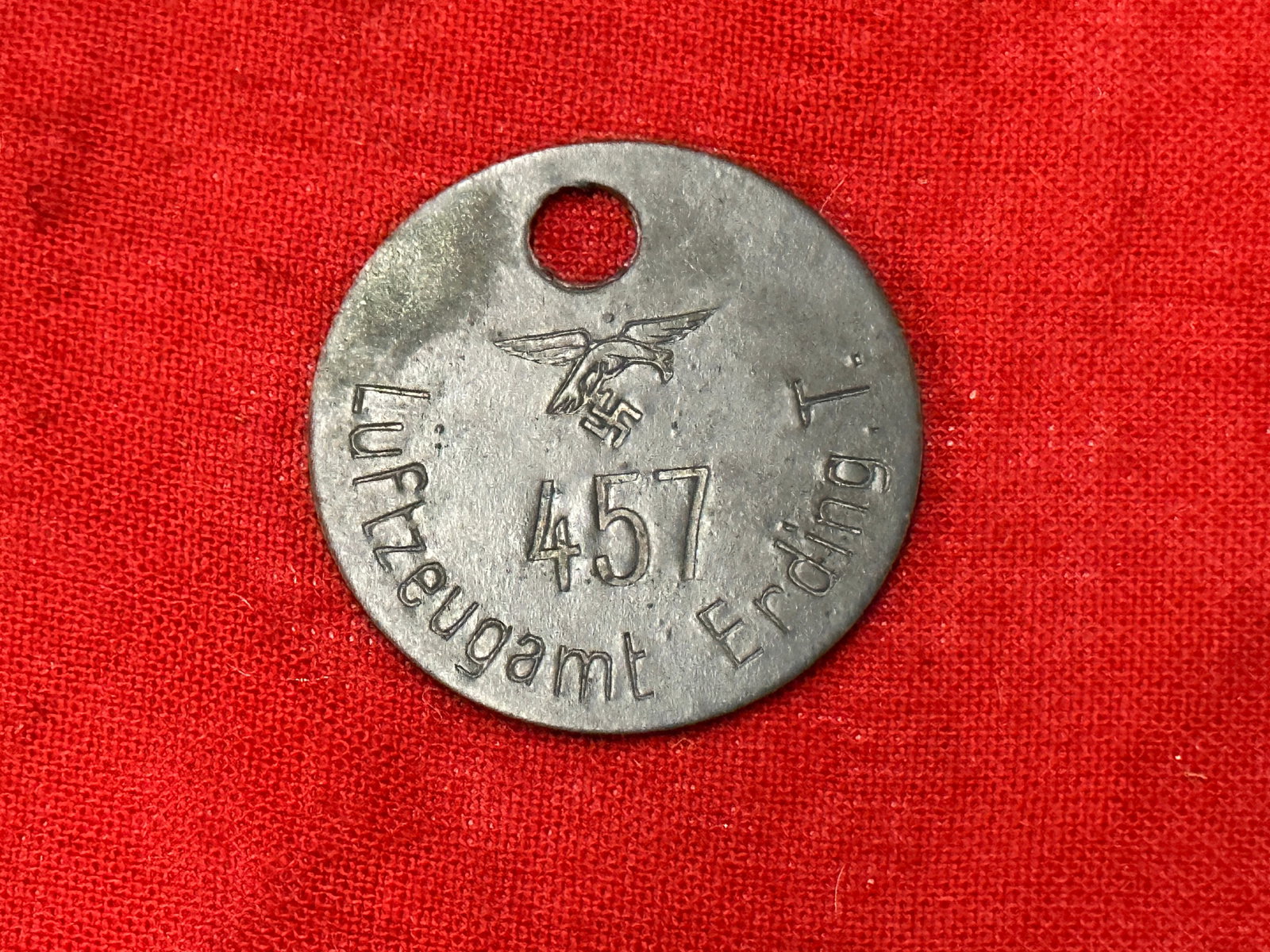 WW2 GERMAN LUFTZEUGAMT ERDING #457 MEDAL: WW2 GERMAN LUFTZEUGAMT ERDING #457 MEDAL. A RARE FIND. SHOWS GOOD WEAR AND USE WITH A BEAUTIFUL OVERALL PATINA. PLEASE VIEW ALL DETAILED PICTURES.