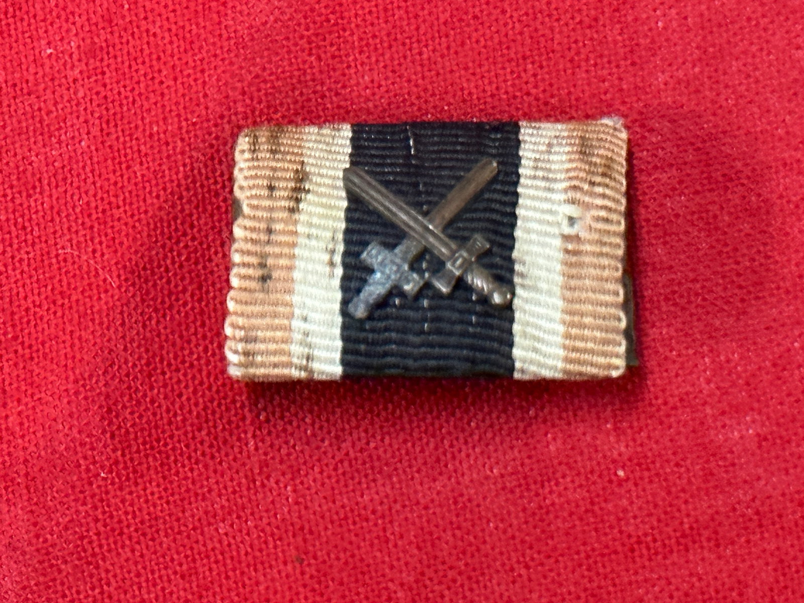 WWII GERMAN WAR MERIT CROSS WITH SWORDS RIBBON BAR: WWII GERMAN WAR MERIT CROSS WITH SWORDS RIBBON BAR. A RARE FIND. SHOWS GOOD WEAR AND USE WITH A BEAUTIFUL OVERALL PATINA. PLEASE VIEW ALL DETAILED PICTURES. A SCARCE FIND.
