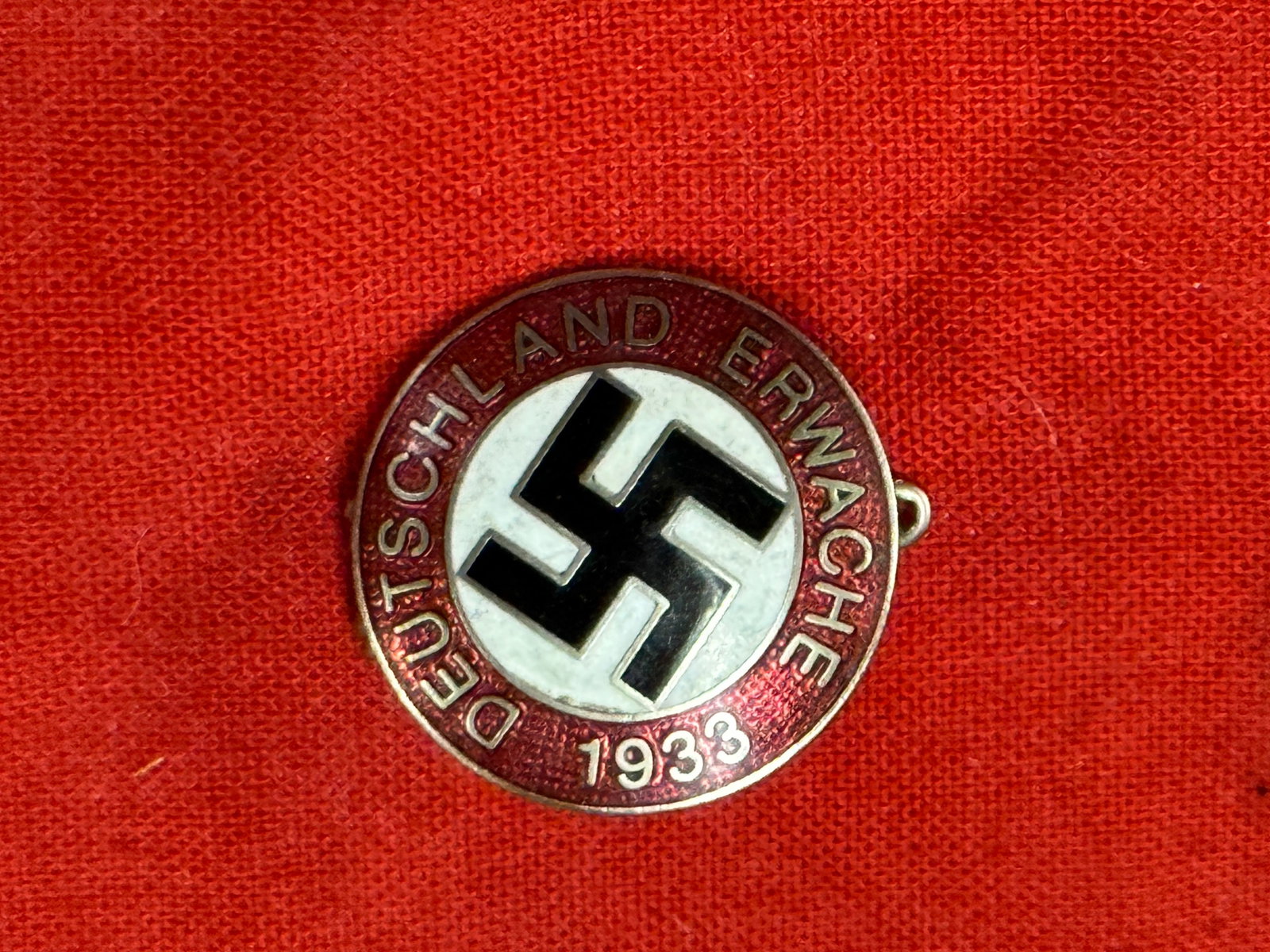 WW2 German Third Reich Deutschland Erwache Badge By RZM M1/129: WW2 German Third Reich Deutschland Erwache Badge By RZM M1/129. A RARE FIND THAT IS IN MINT OVERALL SHAPE AND CONDITION WITH A BEAUTIFUL OVERALL PATINA. PLEASE VIEW ALL DETAILED PICTURES. A SCARCE FIN