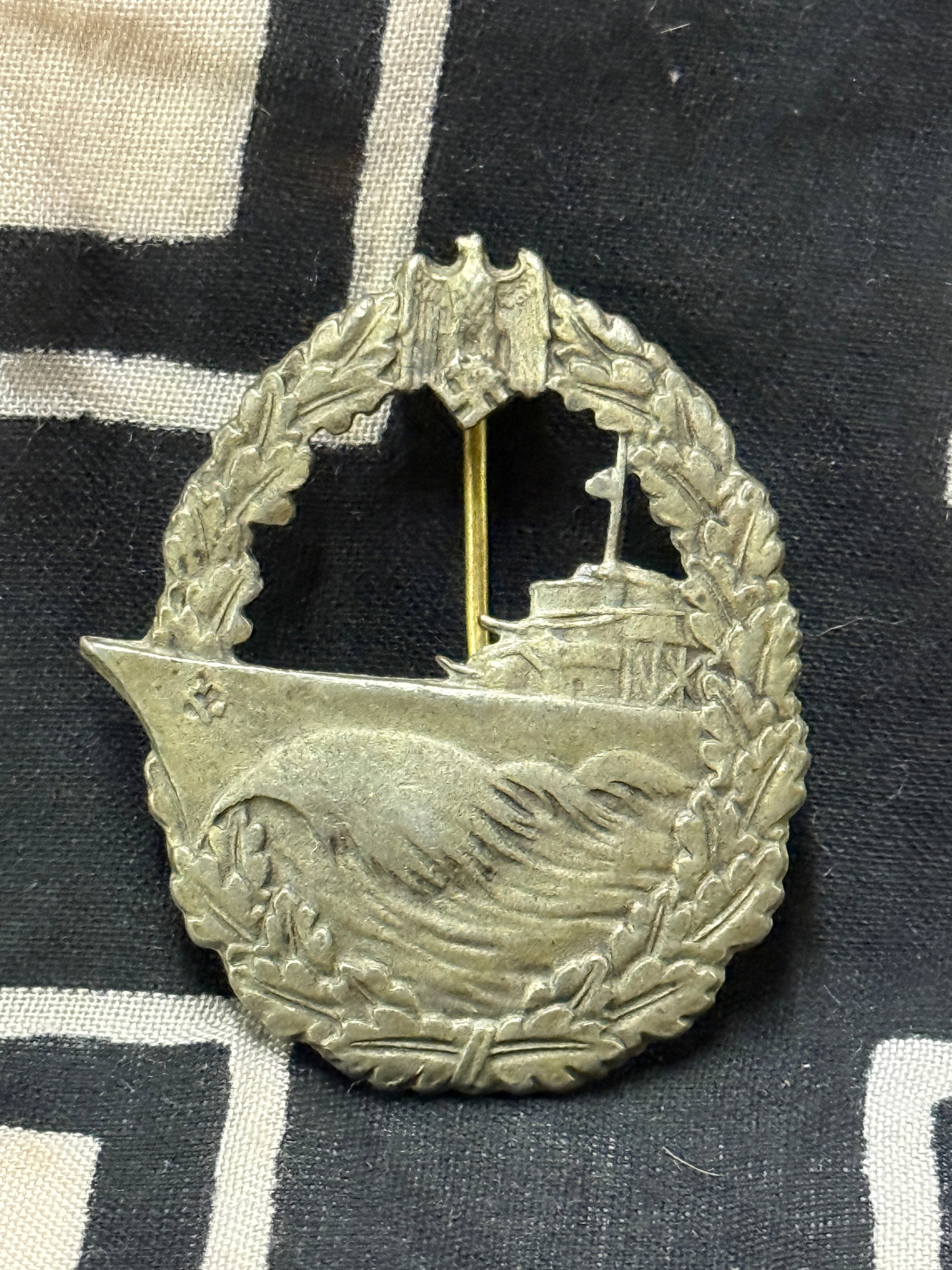 WW2 German Kriegsmarine destroyer badge in silver by R.S.: WW2 German Kriegsmarine destroyer badge in silver by R.S. A rare example that is in mint overall shape and condition with a beautiful overall patina. Shows good wear and use. Please view all detailed 