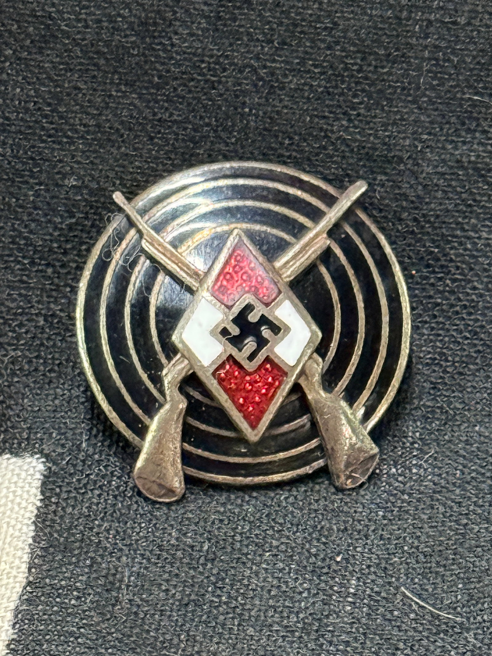 WW2 Germany III Reich. HJ Hitlerjugend Shooting Badge BY RZM M1/14: WW2 Germany III Reich. HJ Hitlerjugend Shooting Badge BY RZM M1/14. A RARE EXAMPLE THAT IS IN MINT OVERALL SHAPE AND CONDITION WITH A BEAUTIFUL OVERALL PATINA. SHOWS GOOD WEAR AND USE. PLEASE VIEW ALL