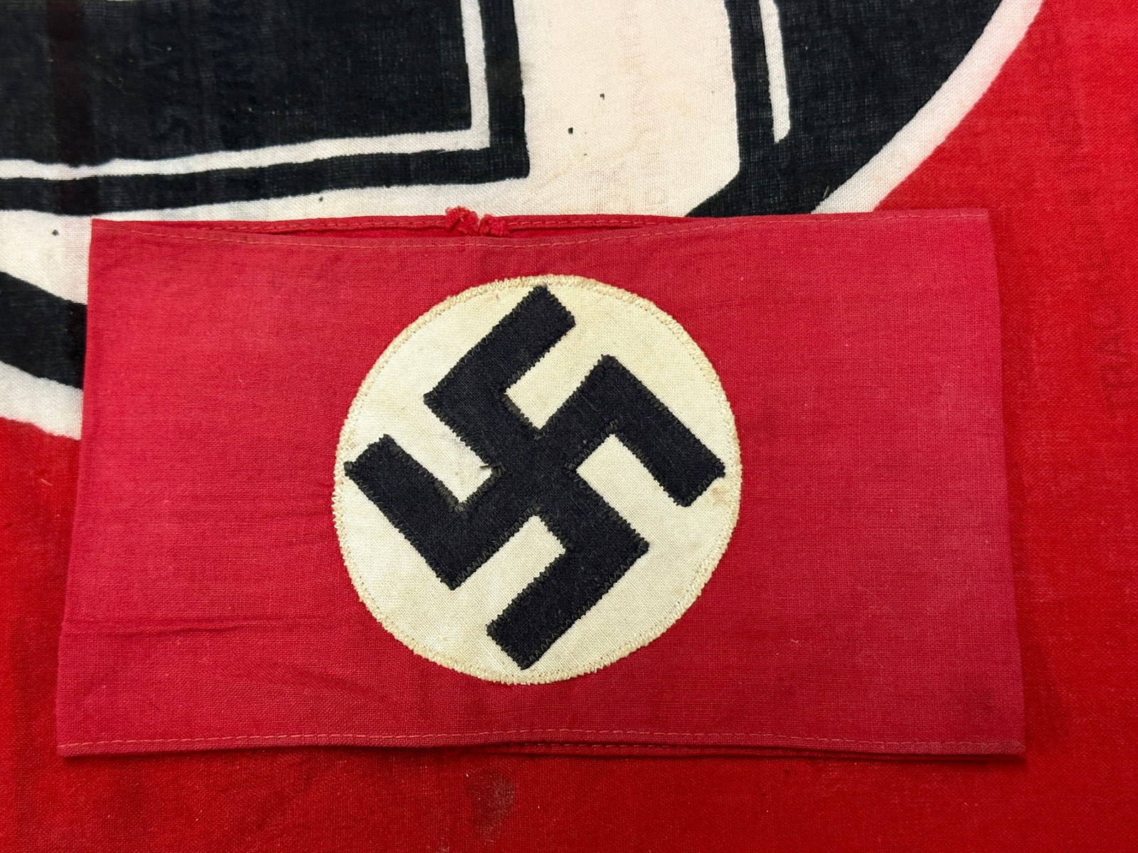 EARLY WW2 GERMAN NSDAP POLITICAL LEADER ARMBAND: EARLY WW2 GERMAN NSDAP POLITICAL LEADER ARMBAND. A VERY RARE EXAMPLE THAT IS IN MINT OVERALL SHAPE AND CONDITION WITH A BEAUTIFUL OVERALL PATINA. PLEASE VIEW ALL DETAILED PICTURES. A SCARCE EXAMPLE.